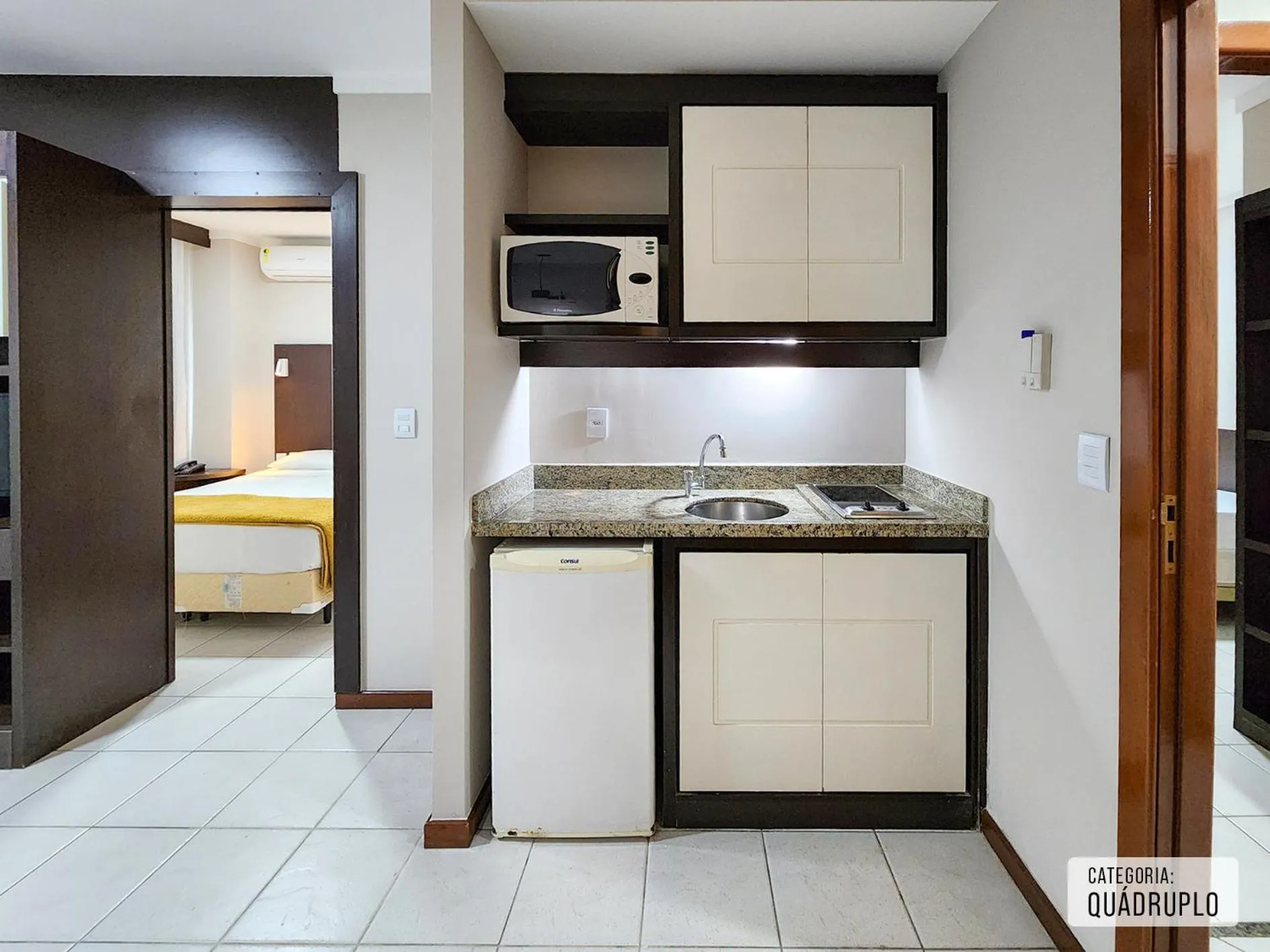 Bed in Triângulo Apart Hotel