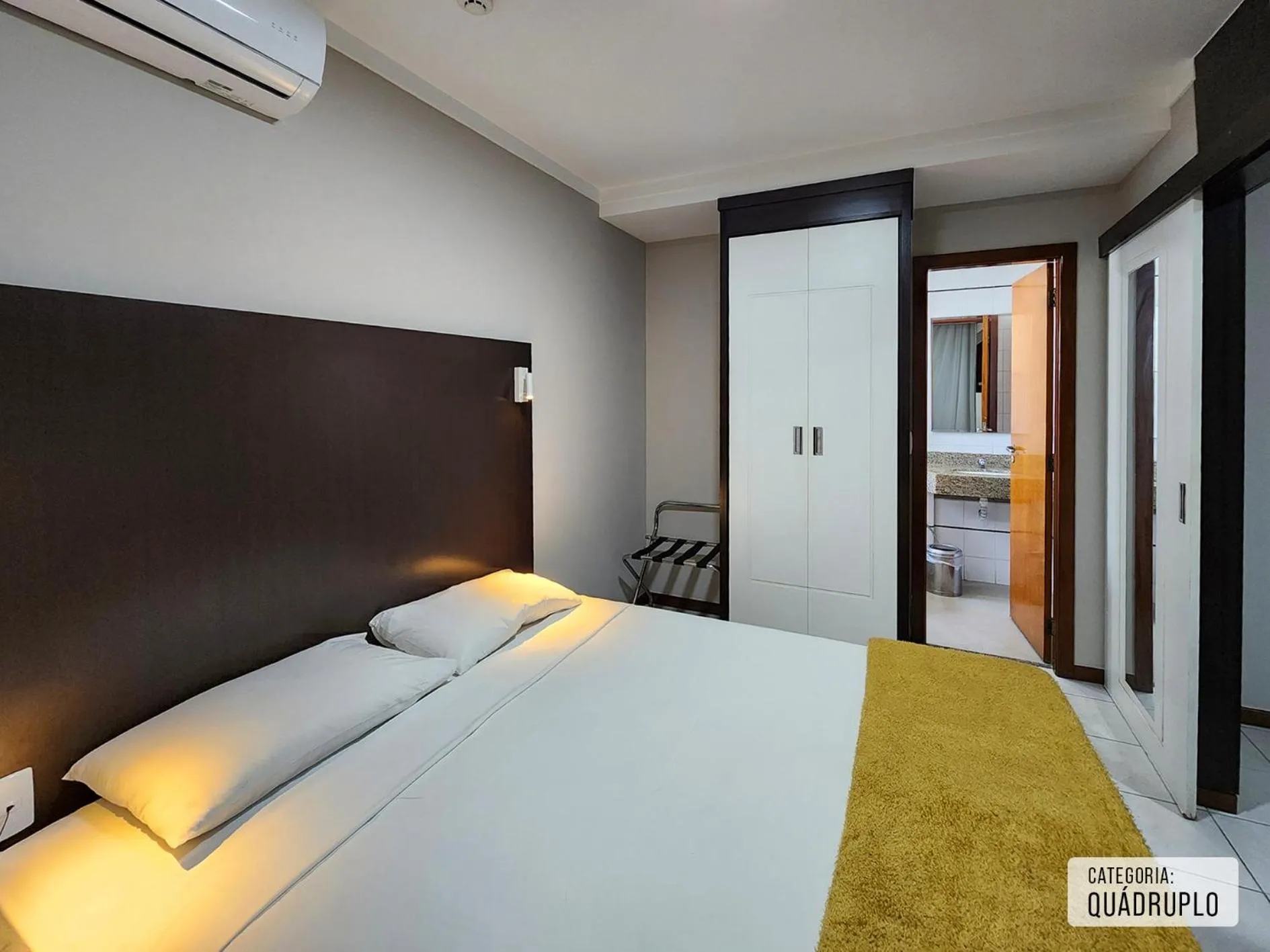 Bed in Triângulo Apart Hotel