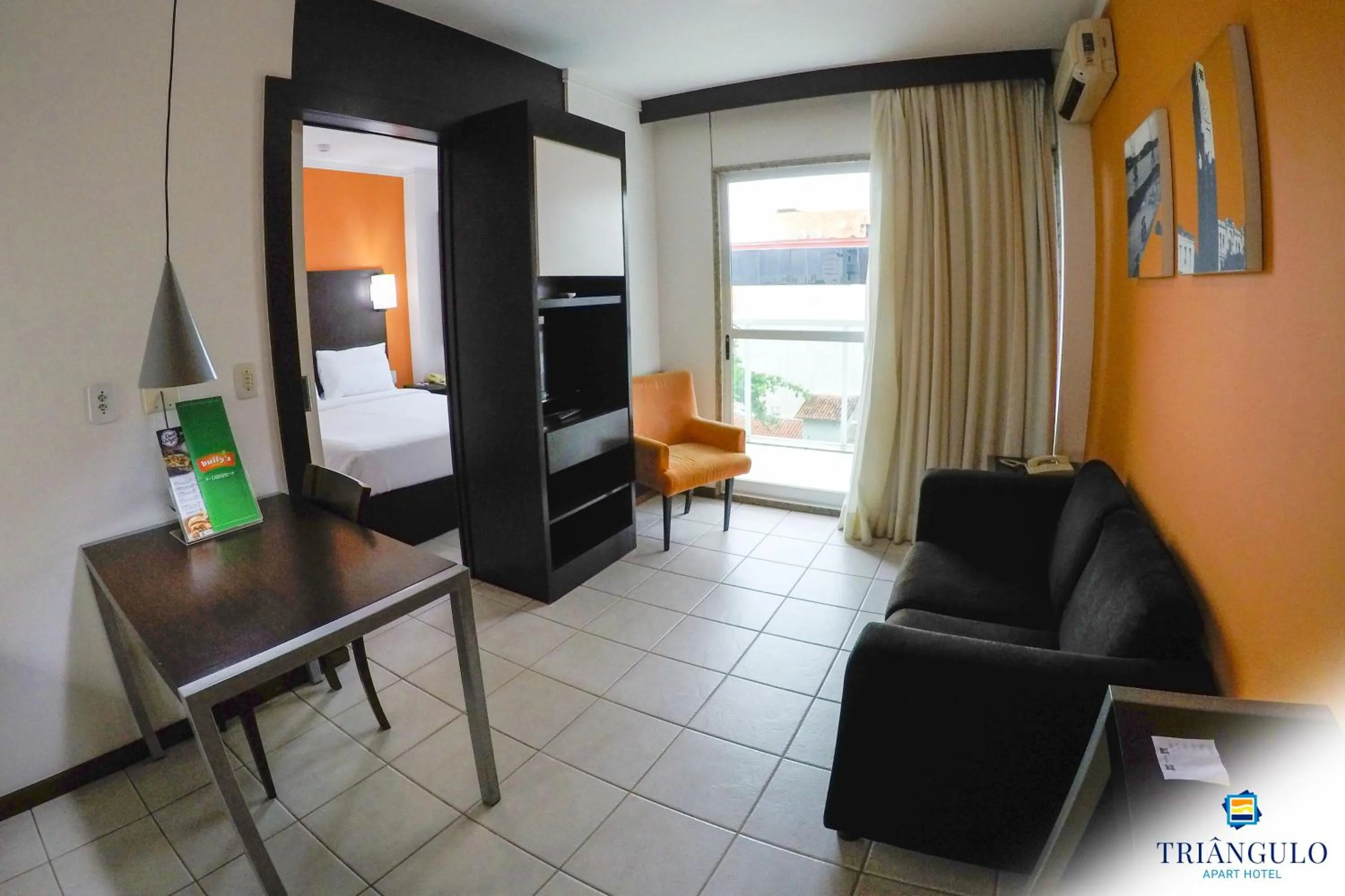 Living room, Bed in Triângulo Apart Hotel