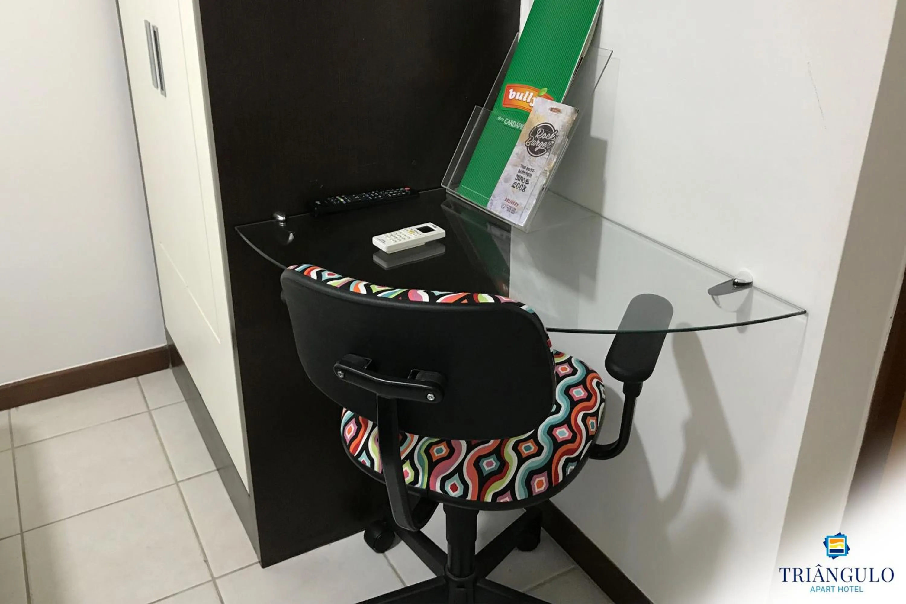 Photo of the whole room in Triângulo Apart Hotel