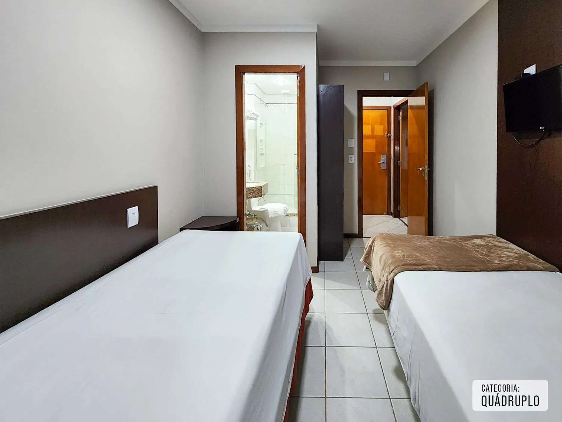 Bed in Triângulo Apart Hotel