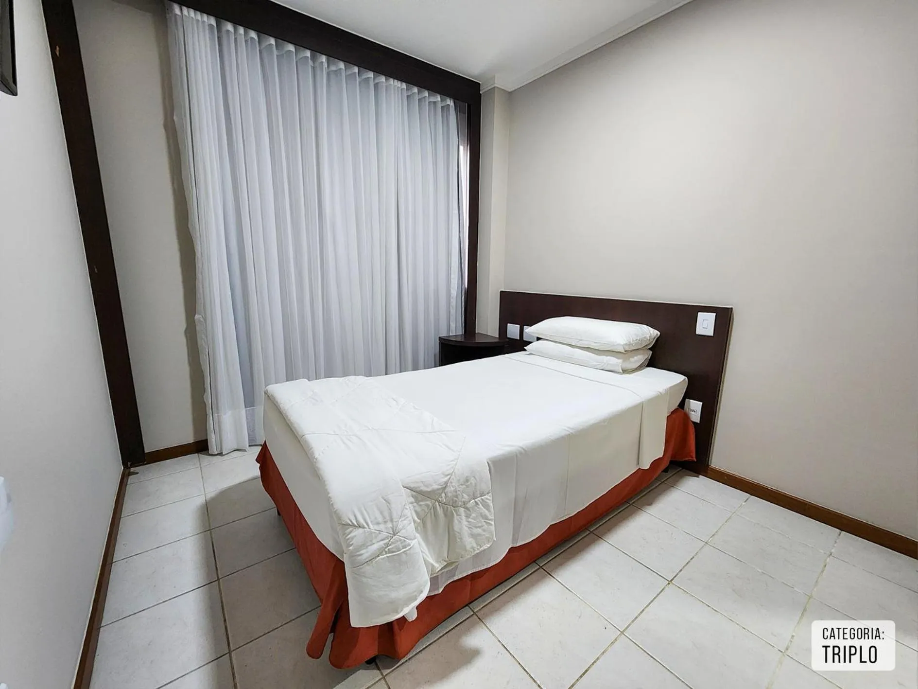 Bed in Triângulo Apart Hotel