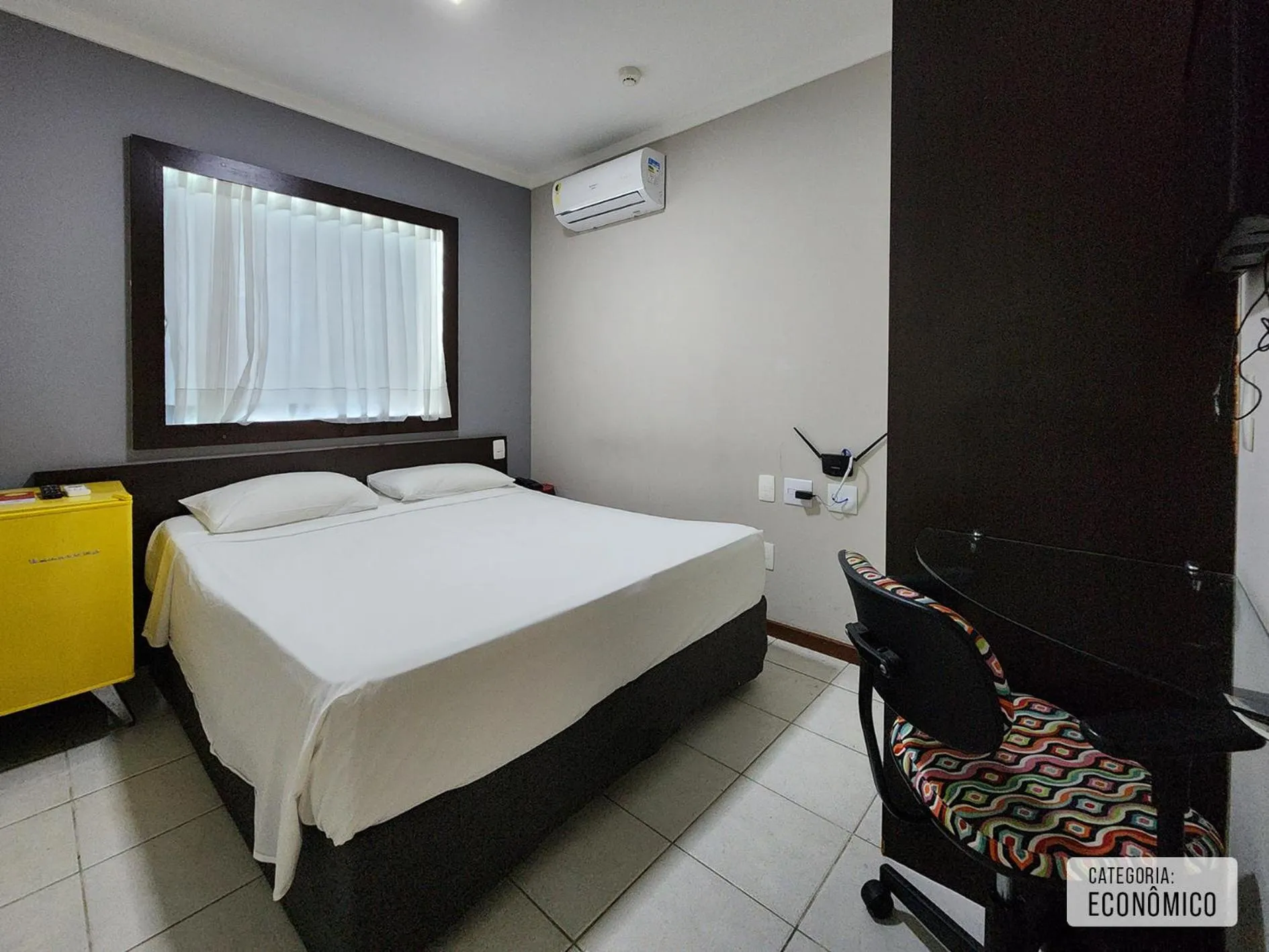 Bed in Triângulo Apart Hotel