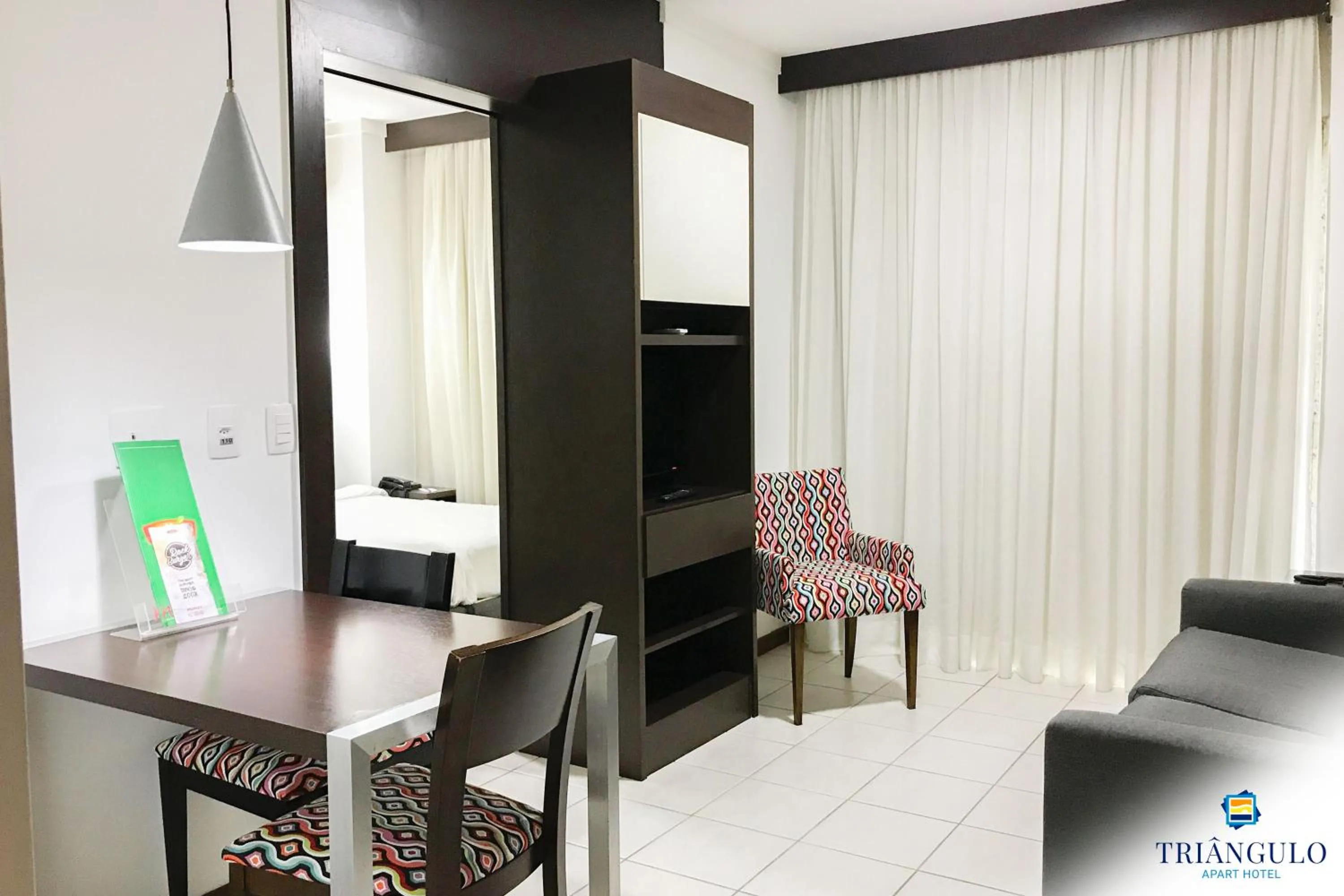 Living room in Triângulo Apart Hotel