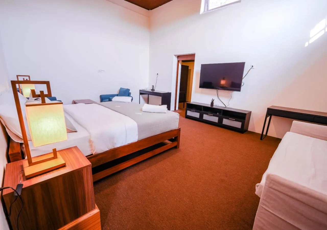 Bed in Lauriston Ooty Town Heritage Bungalow by VOYE HOMES