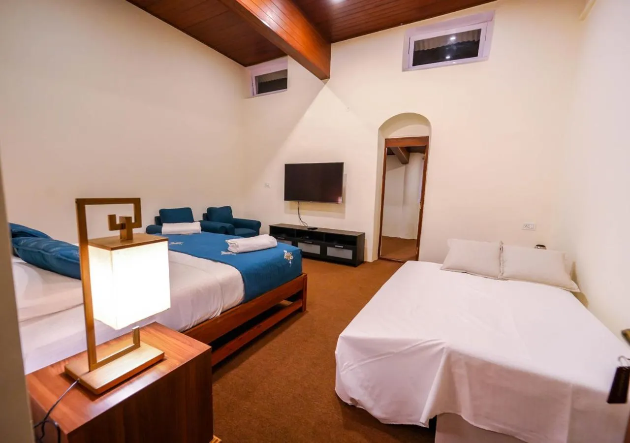 Bed in Lauriston Ooty Town Heritage Bungalow by VOYE HOMES