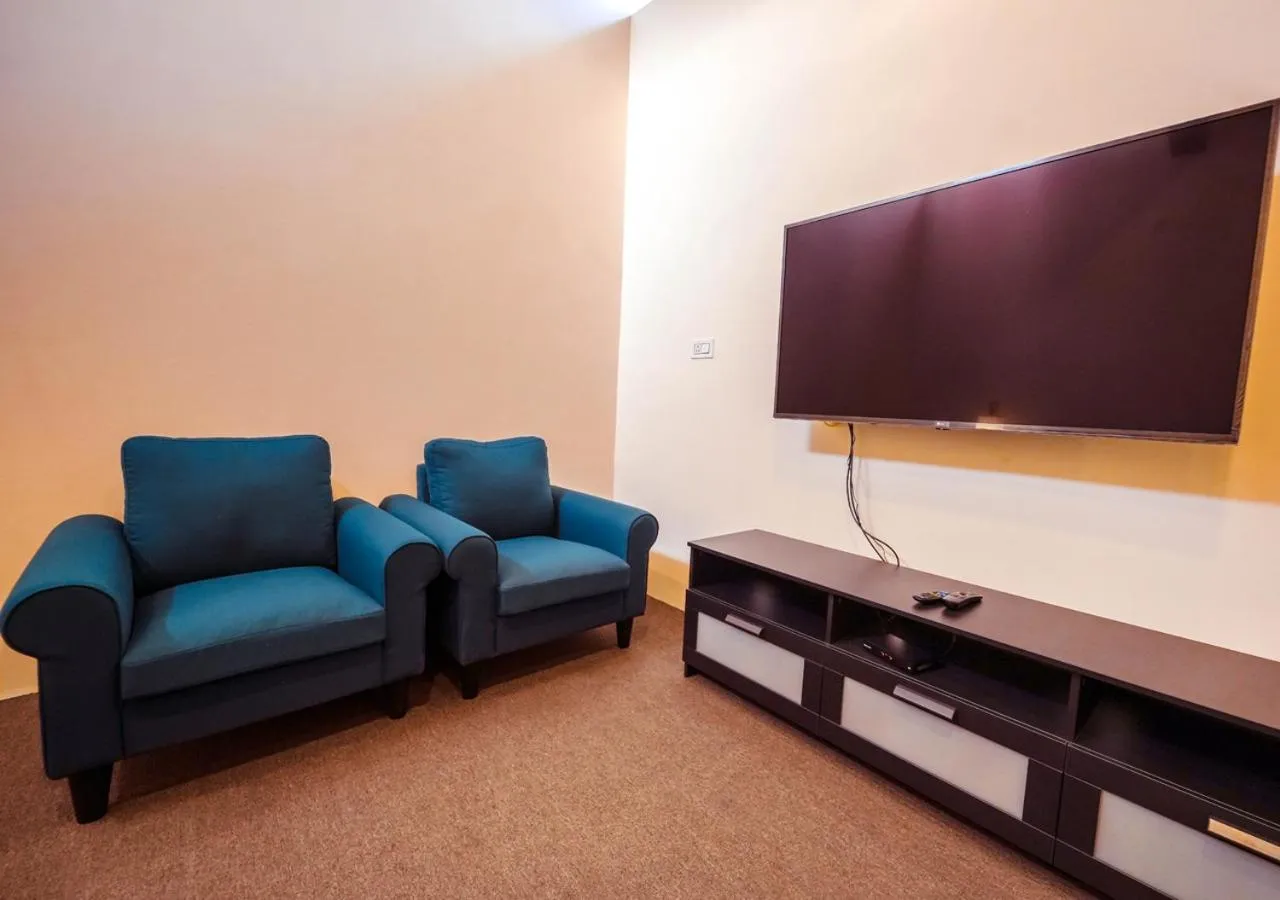 TV and multimedia in Lauriston Ooty Town Heritage Bungalow by VOYE HOMES