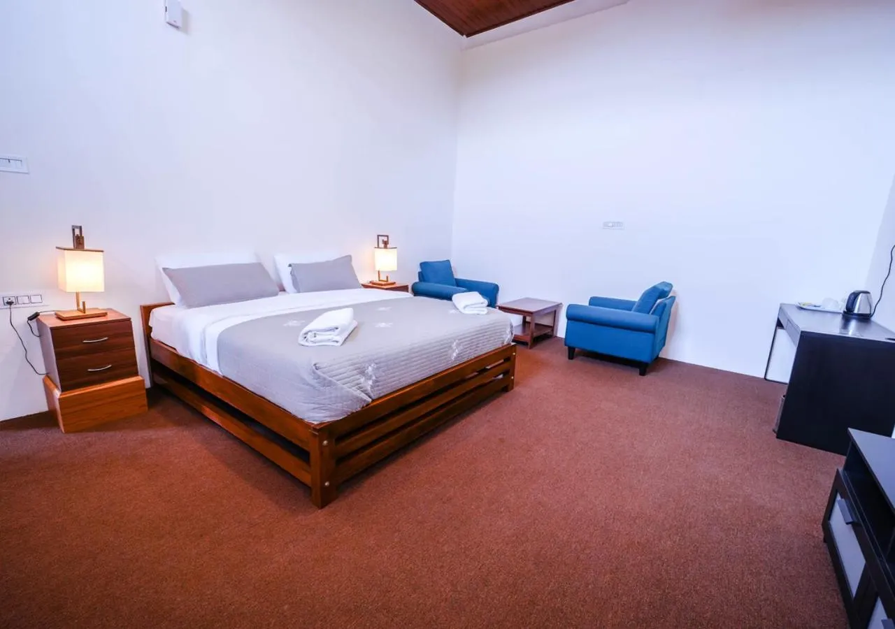 Bed in Lauriston Ooty Town Heritage Bungalow by VOYE HOMES