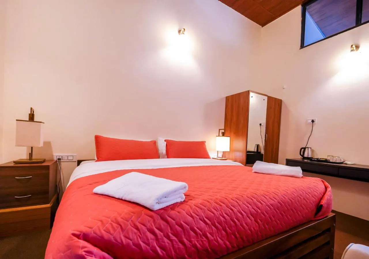 Bed in Lauriston Ooty Town Heritage Bungalow by VOYE HOMES