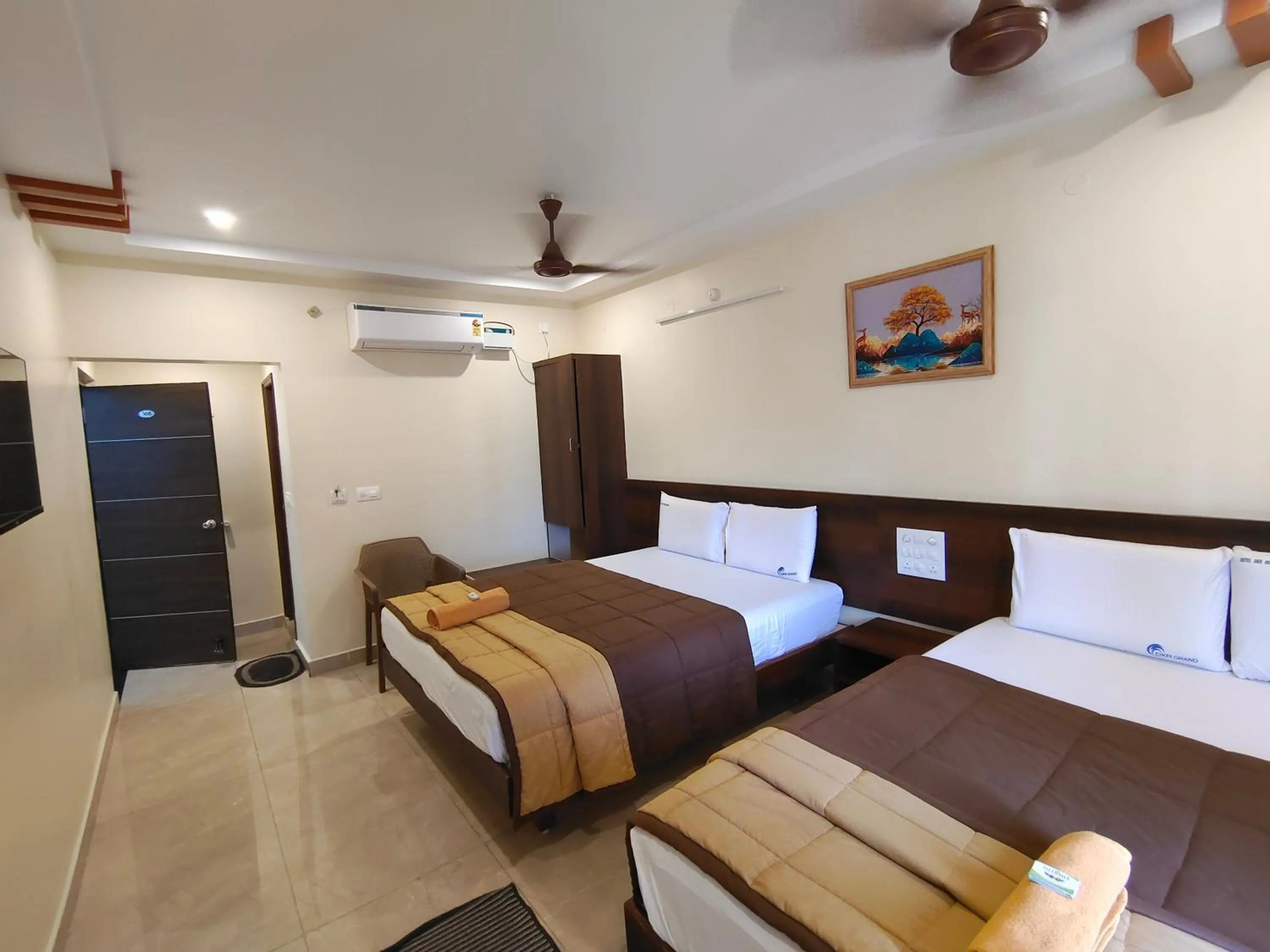 Photo of the whole room, Bed in HOTEL DKR GRAND