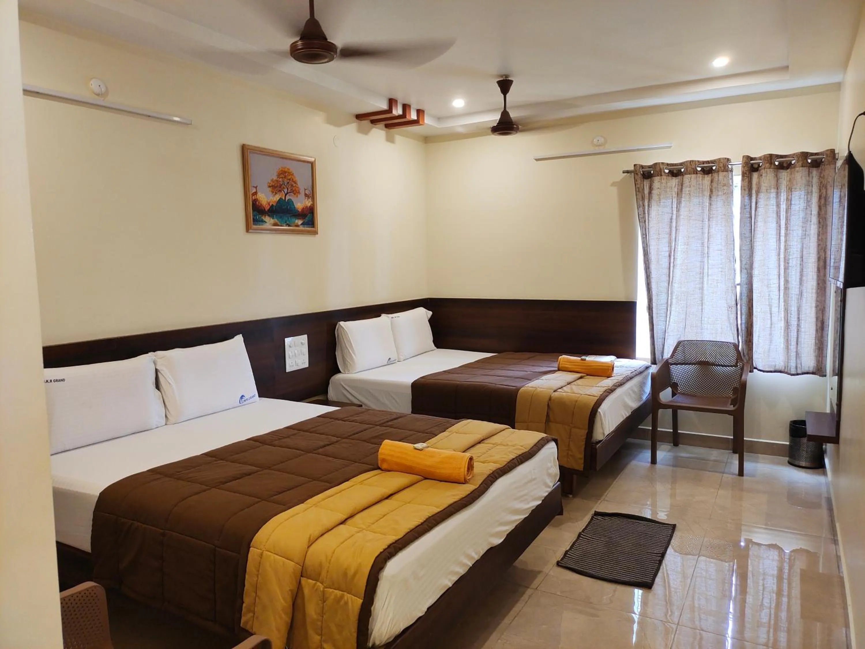 Photo of the whole room, Bed in HOTEL DKR GRAND