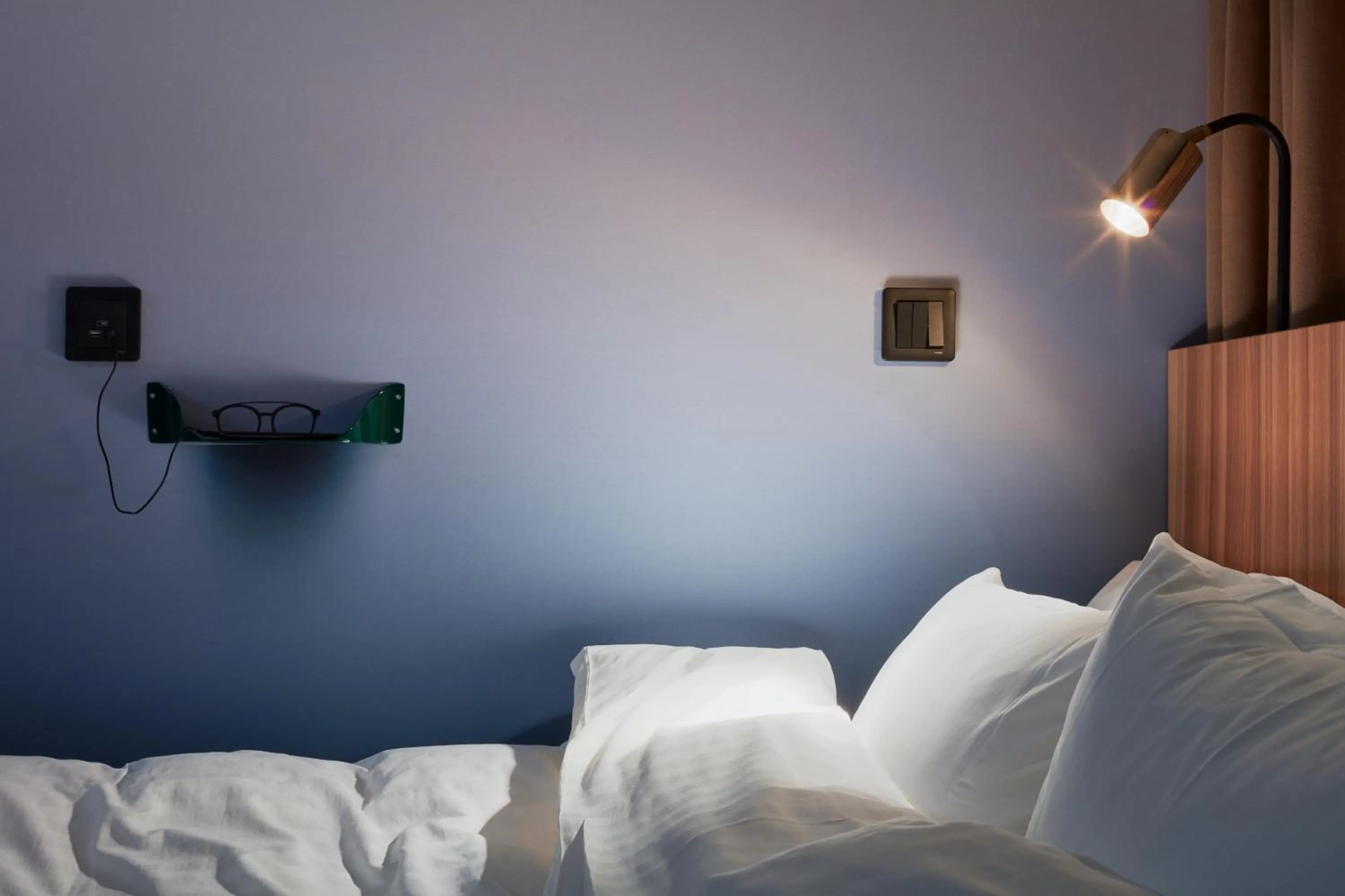 Bed in Zzz Dreamscape Hotel