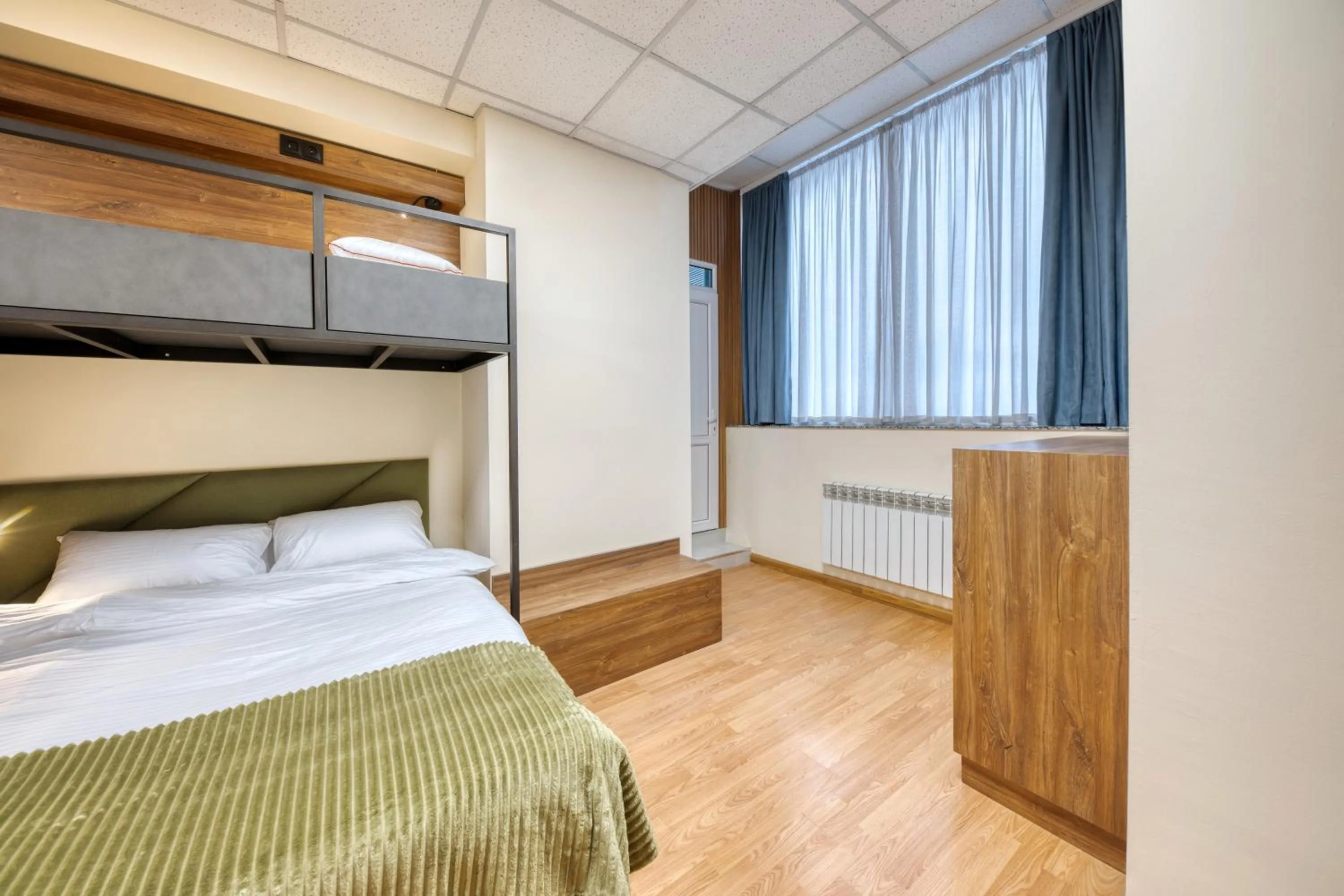 Bed in Tropica Inn Hotel