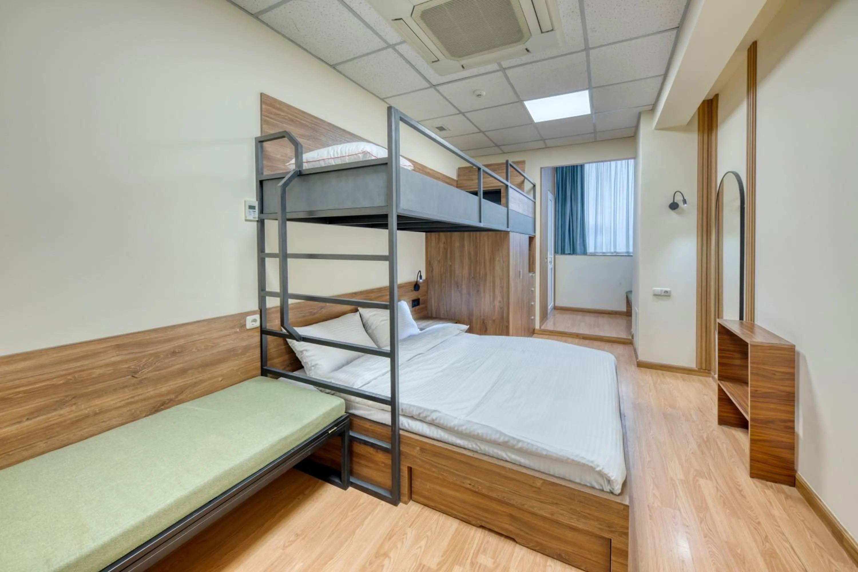 Bed in Tropica Inn Hotel