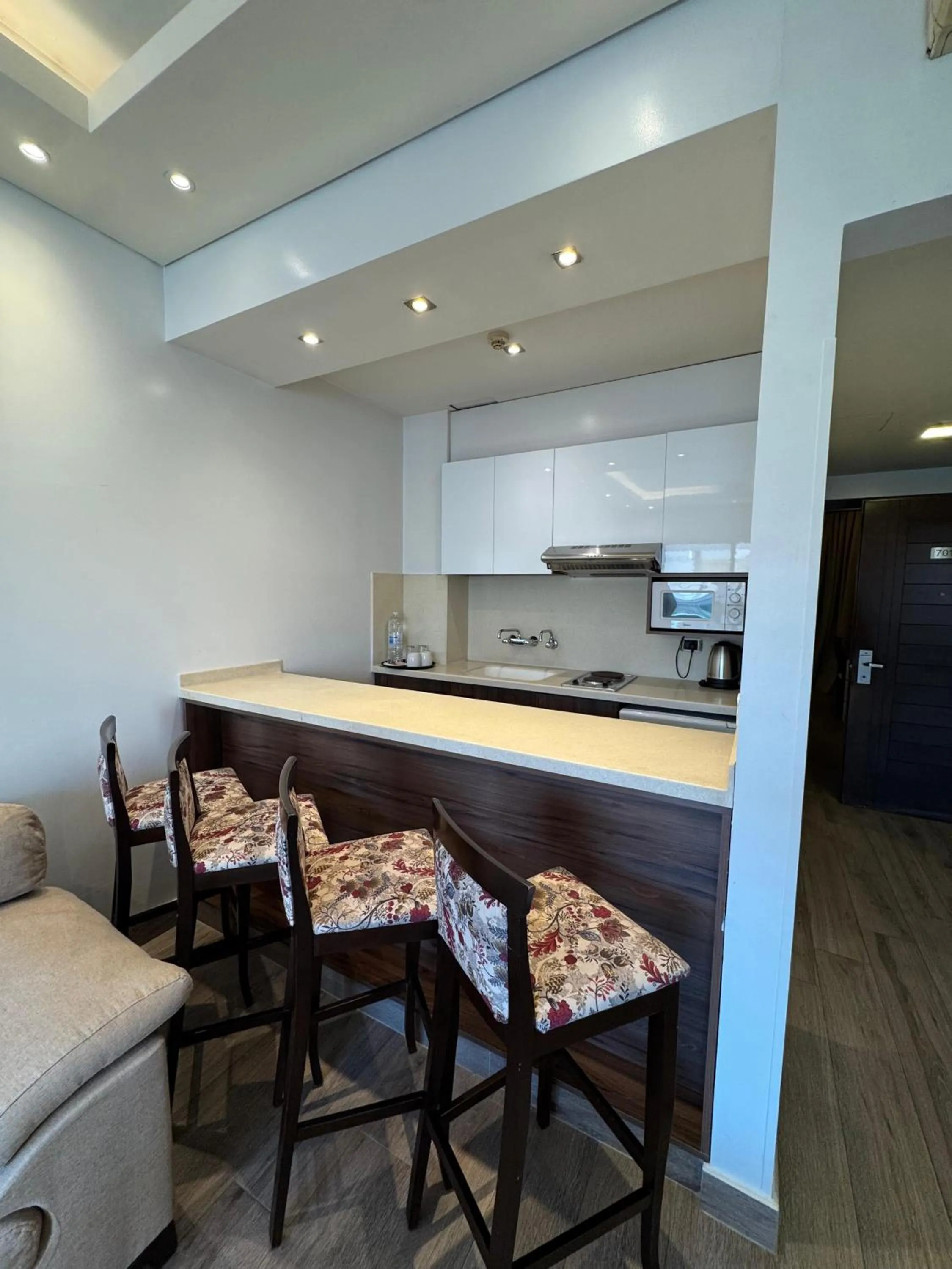 Kitchen or kitchenette in Ny Suites