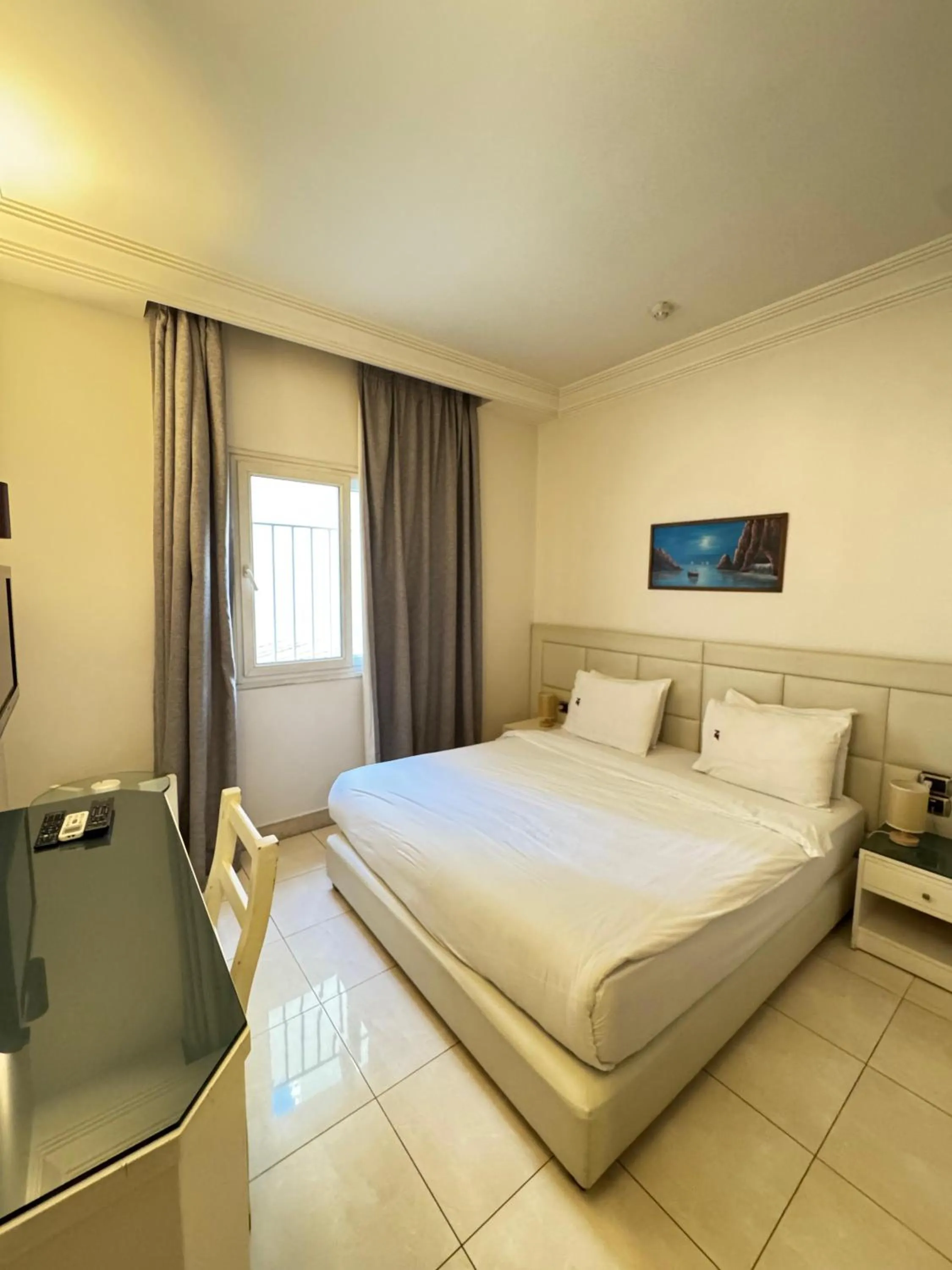 Photo of the whole room, Bed in Ny Suites