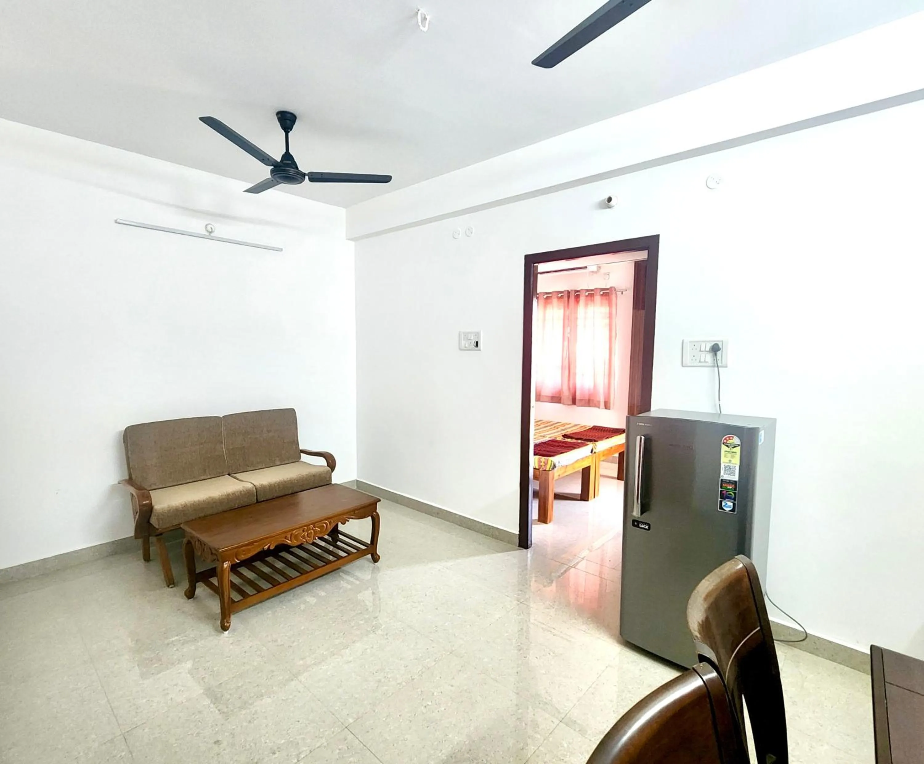 Living room in Sishya Hotels & Service Apartment Thoraipakkam, Chennai OMR, IT Expressway
