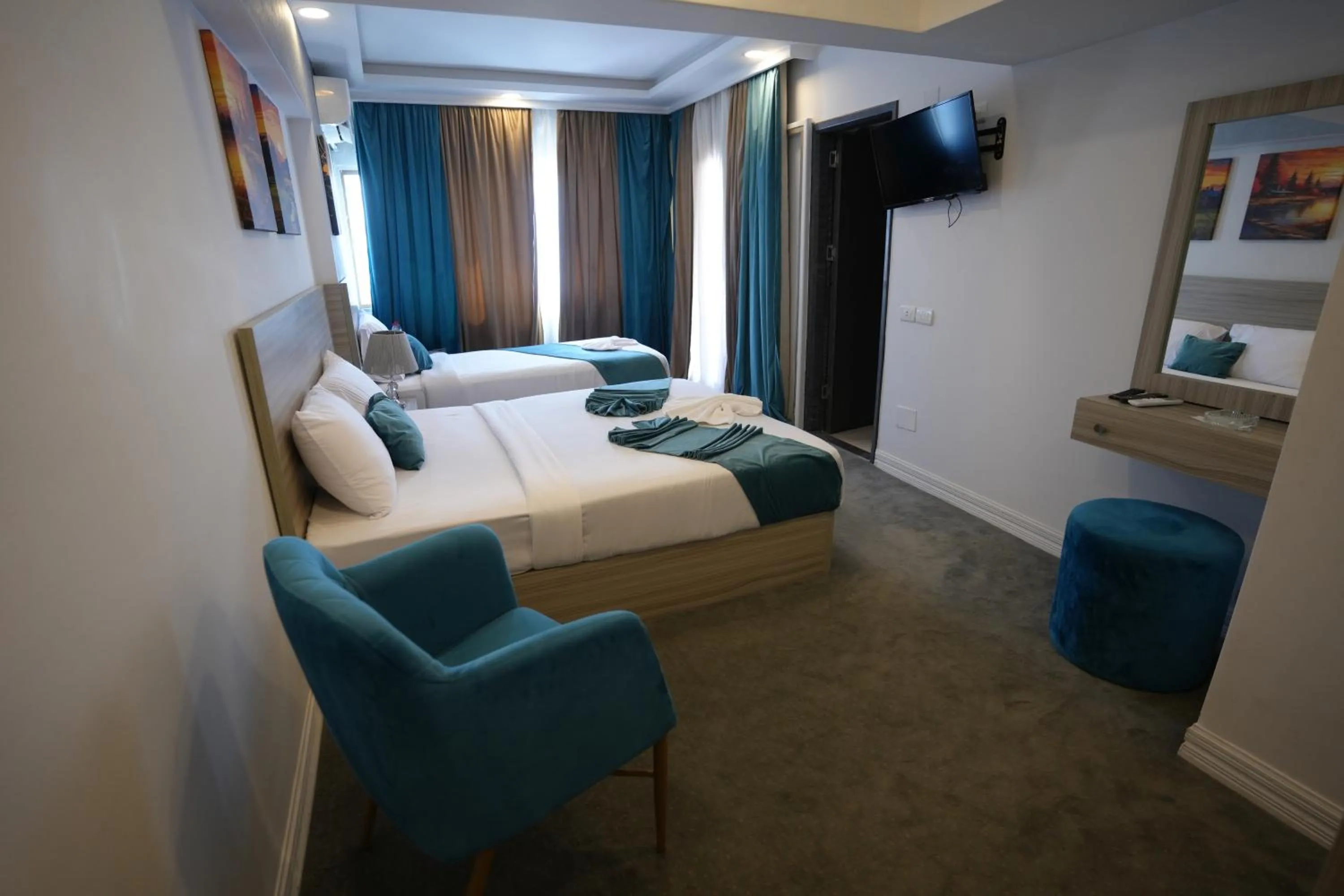 Bed in Mar Charbel Hotel Cairo