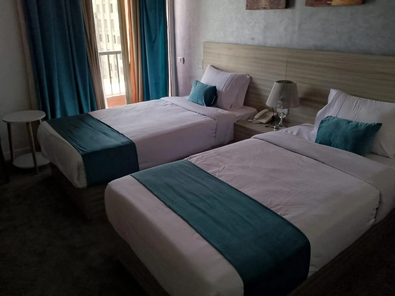 Bed in Mar Charbel Hotel Cairo