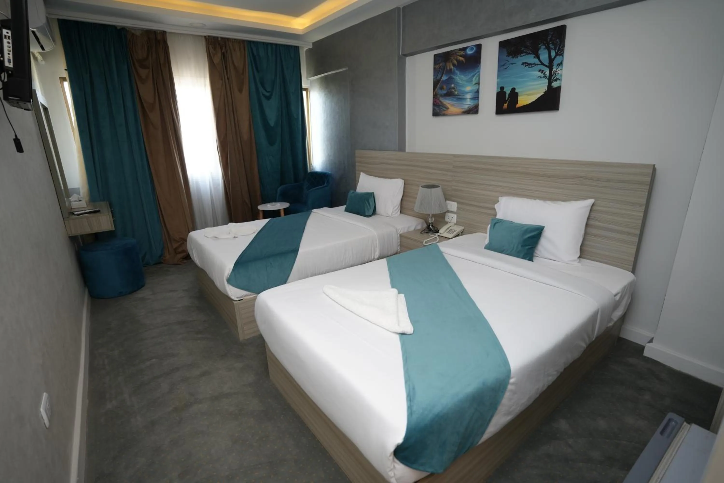 Bed in Mar Charbel Hotel Cairo