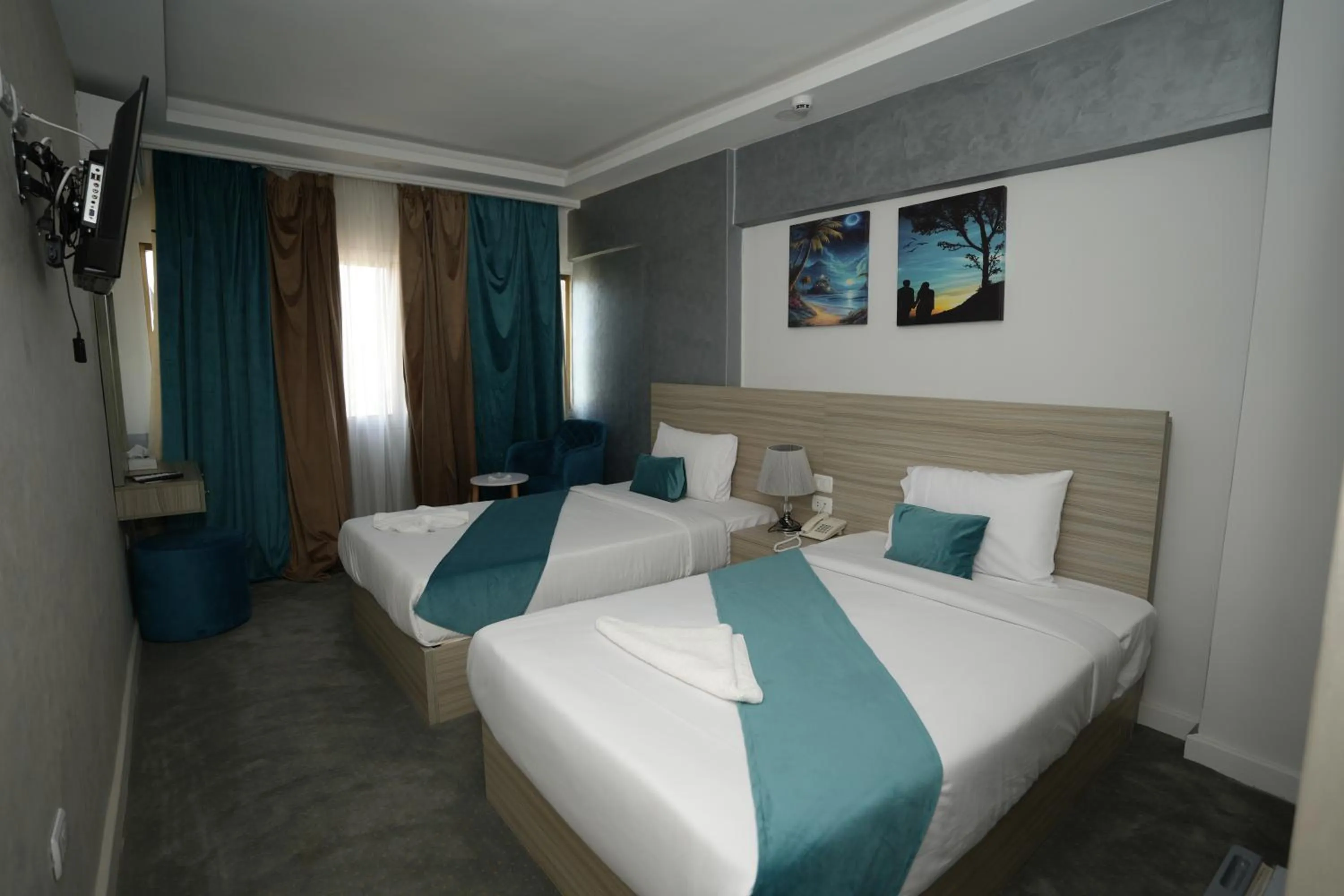 Bed in Mar Charbel Hotel Cairo