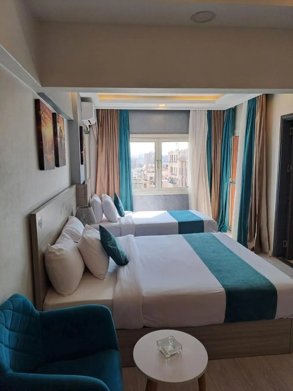 Bed in Mar Charbel Hotel Cairo