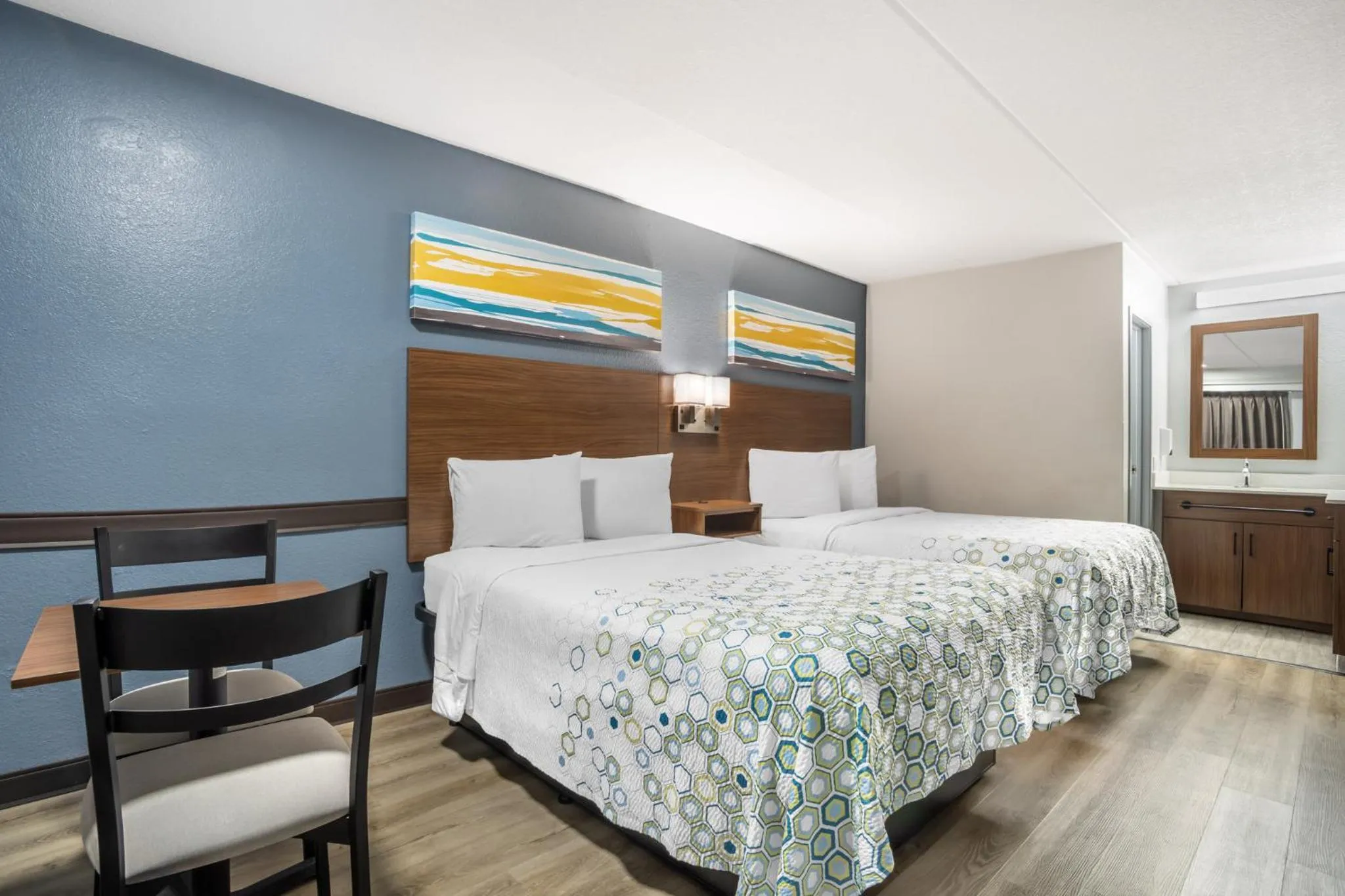 Photo of the whole room, Bed in HomeTowne Studios by Red Roof Greenville