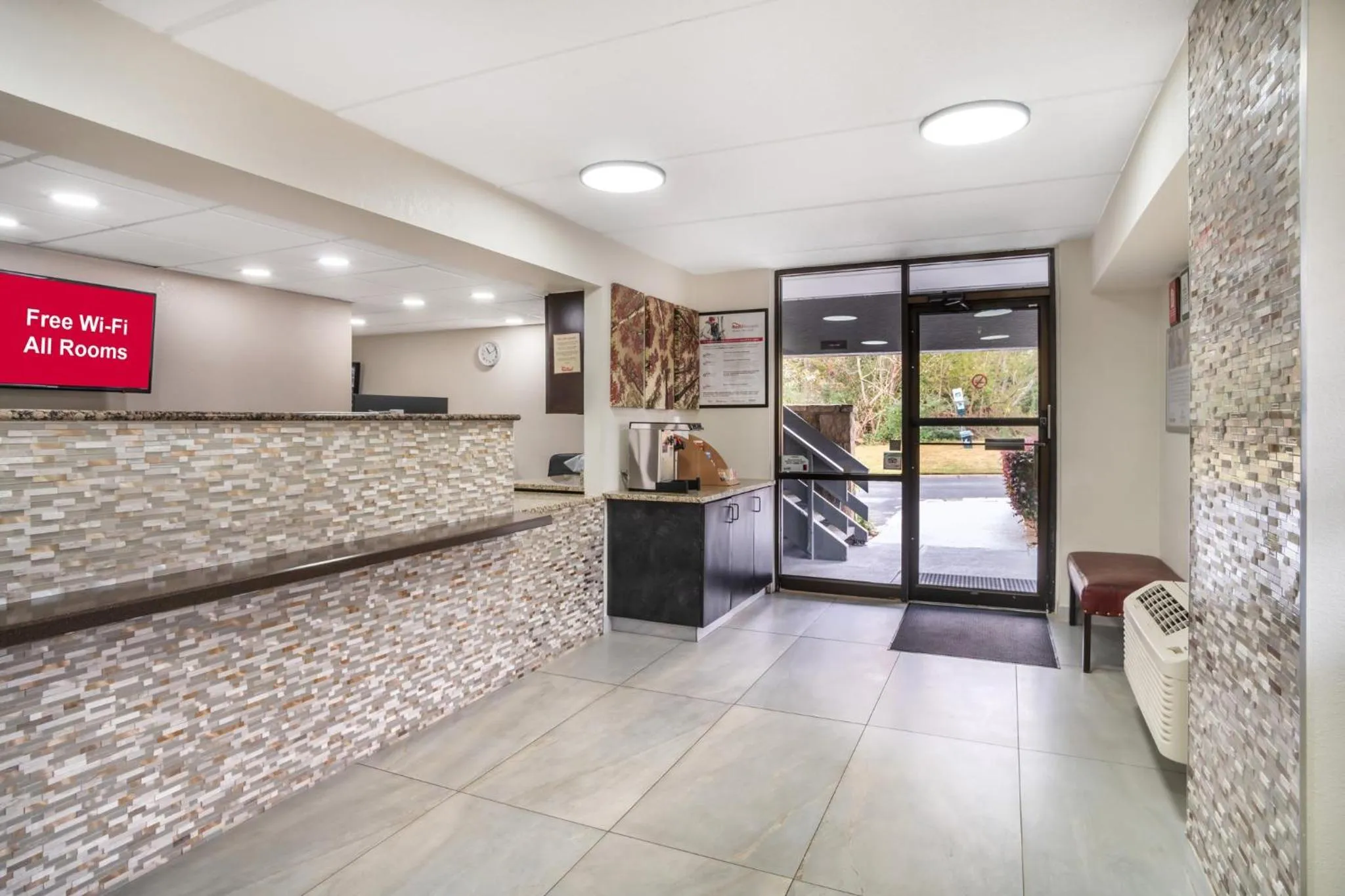 Lobby or reception in HomeTowne Studios by Red Roof Greenville