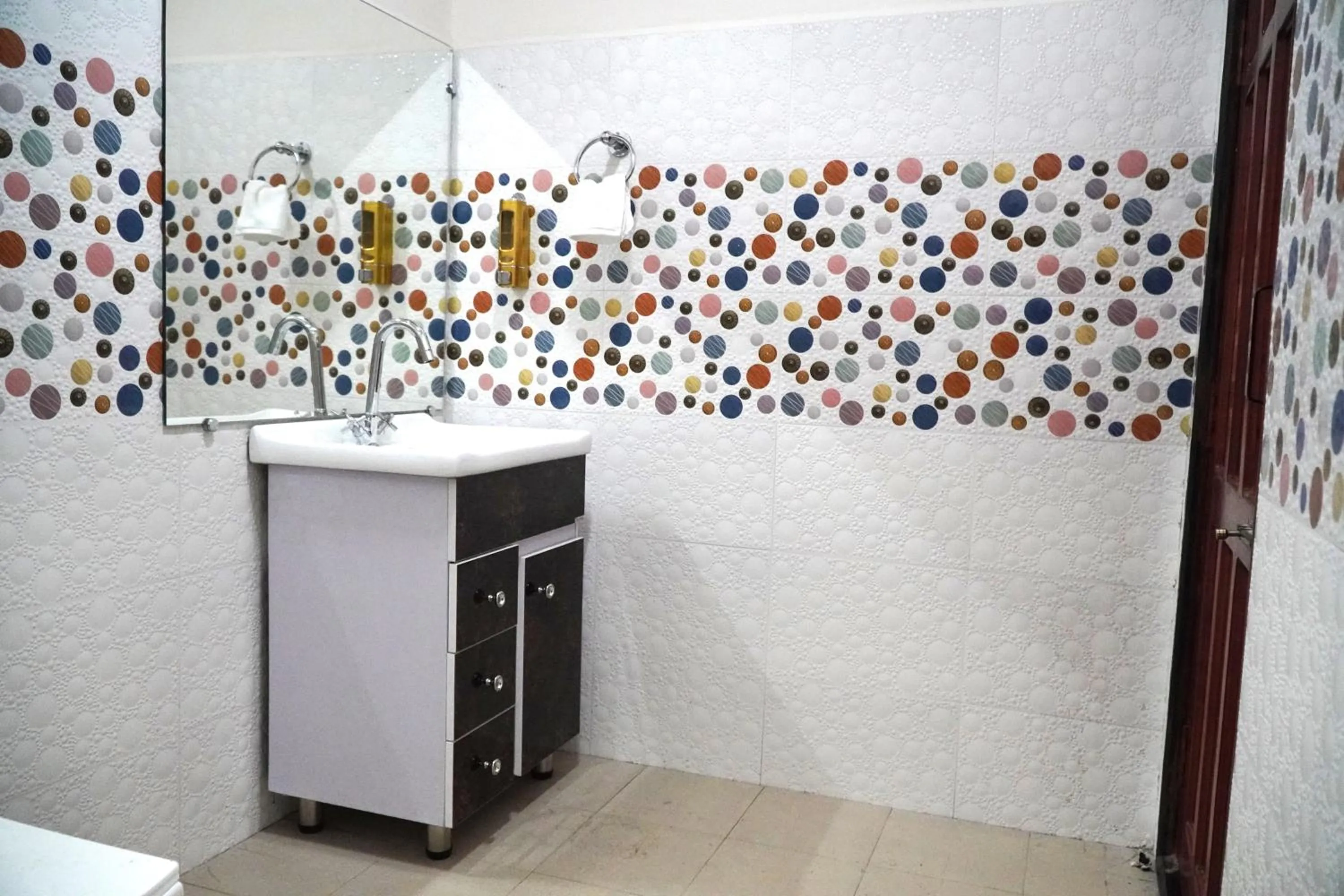 Bathroom in ROYALTY GLOBAL HOMESTAY