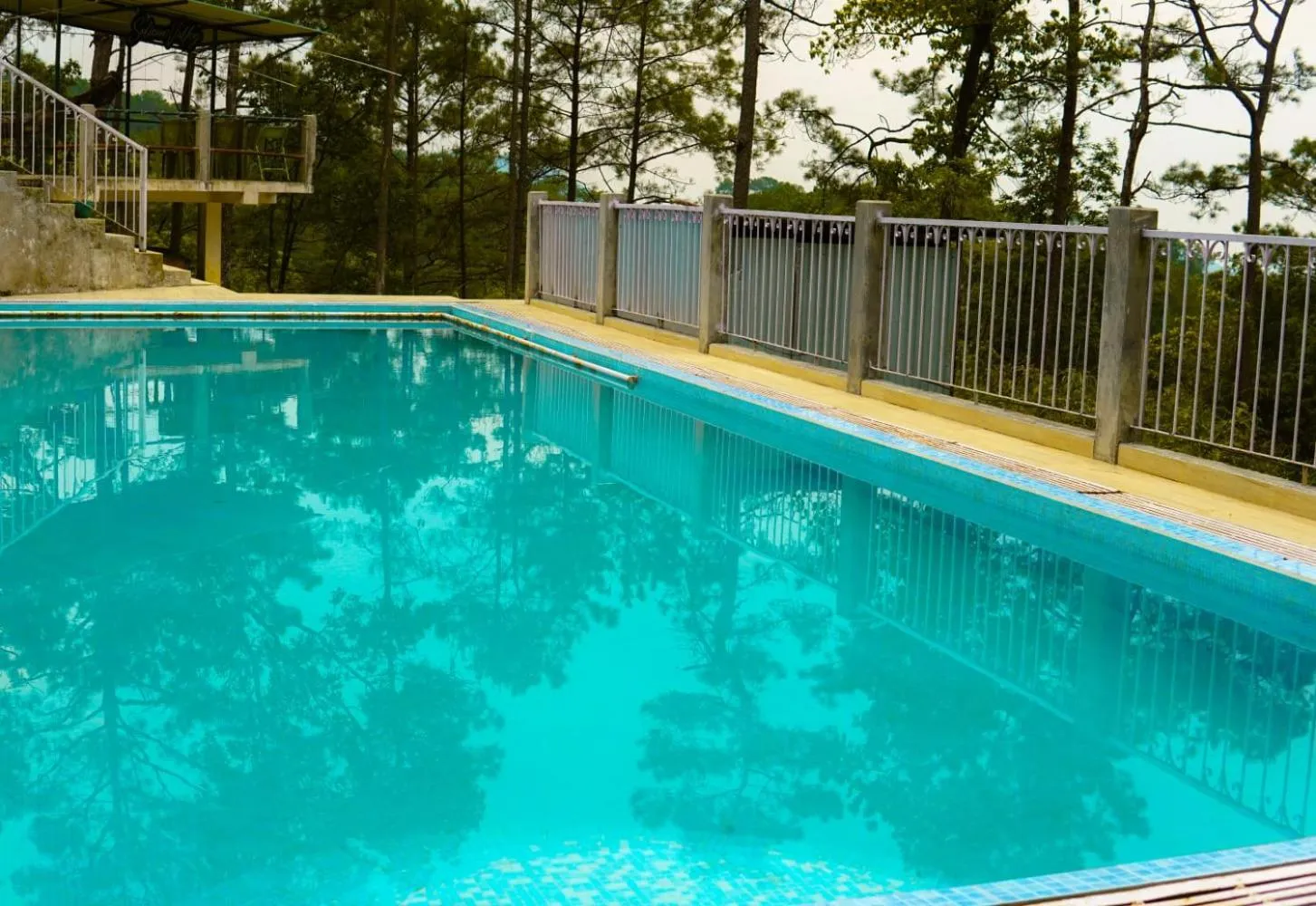 Swimming pool in ROYALTY GLOBAL HOMESTAY