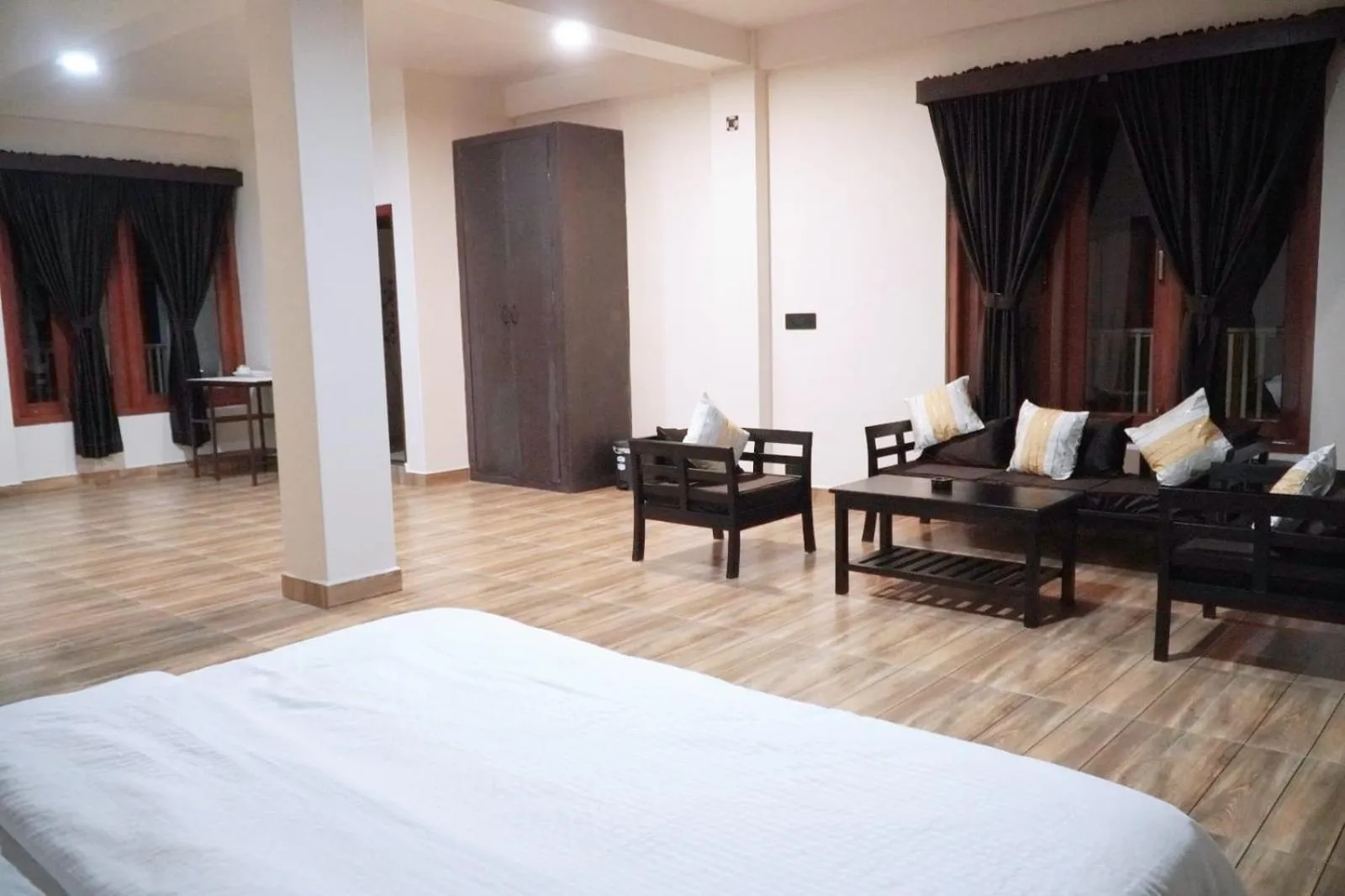 Bed in ROYALTY GLOBAL HOMESTAY