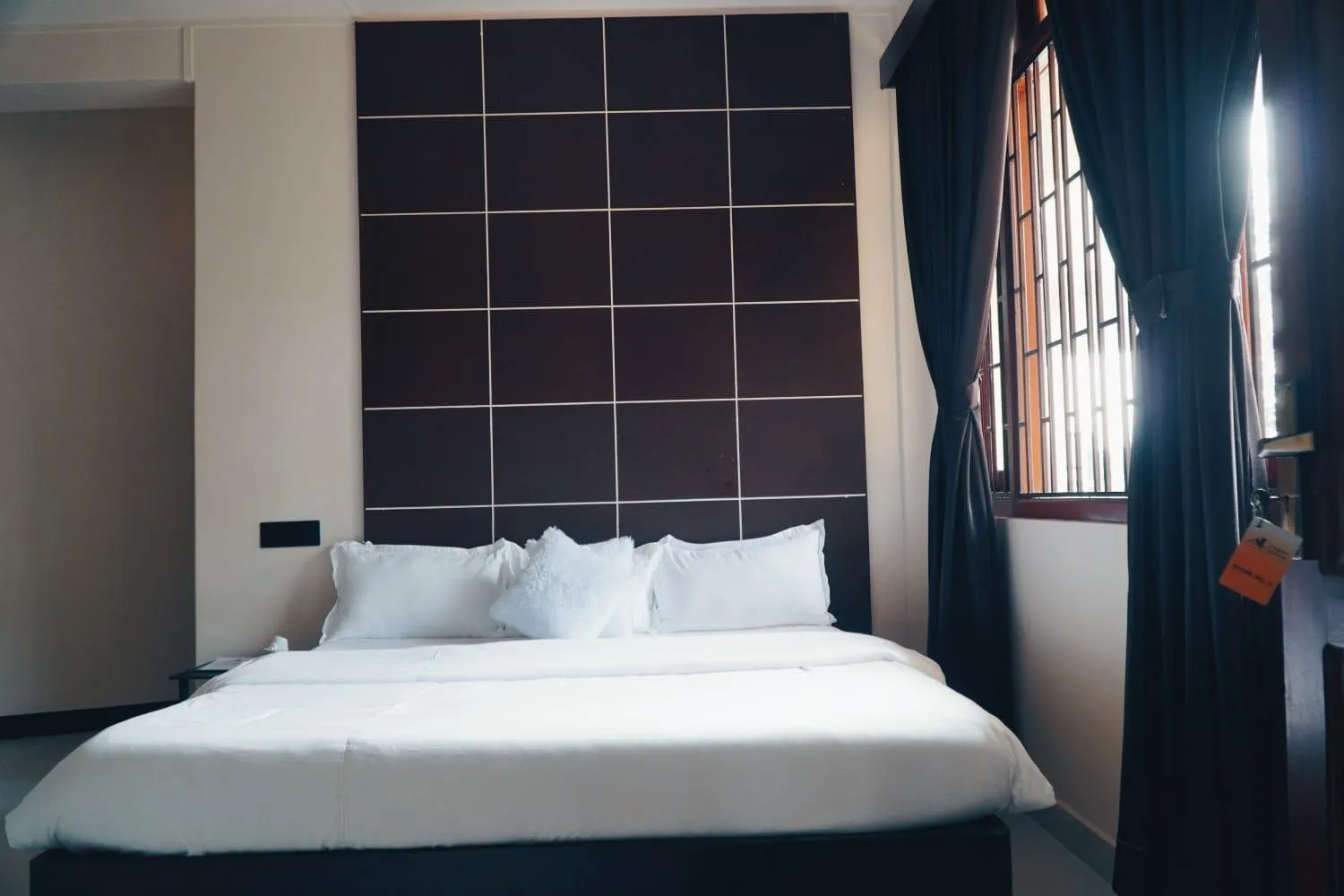 Bed in ROYALTY GLOBAL HOMESTAY