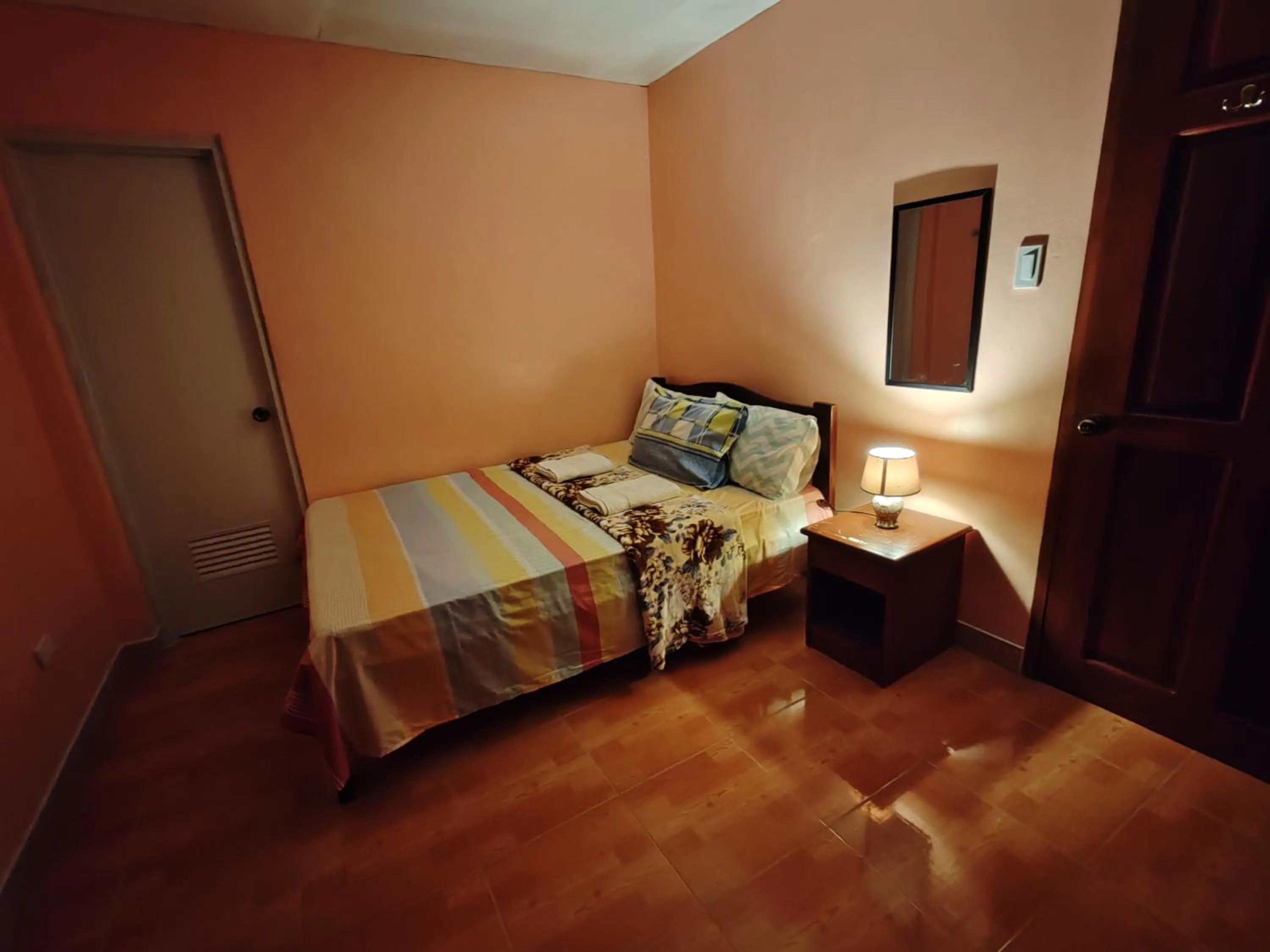 Bed in TGH Guest House Badian