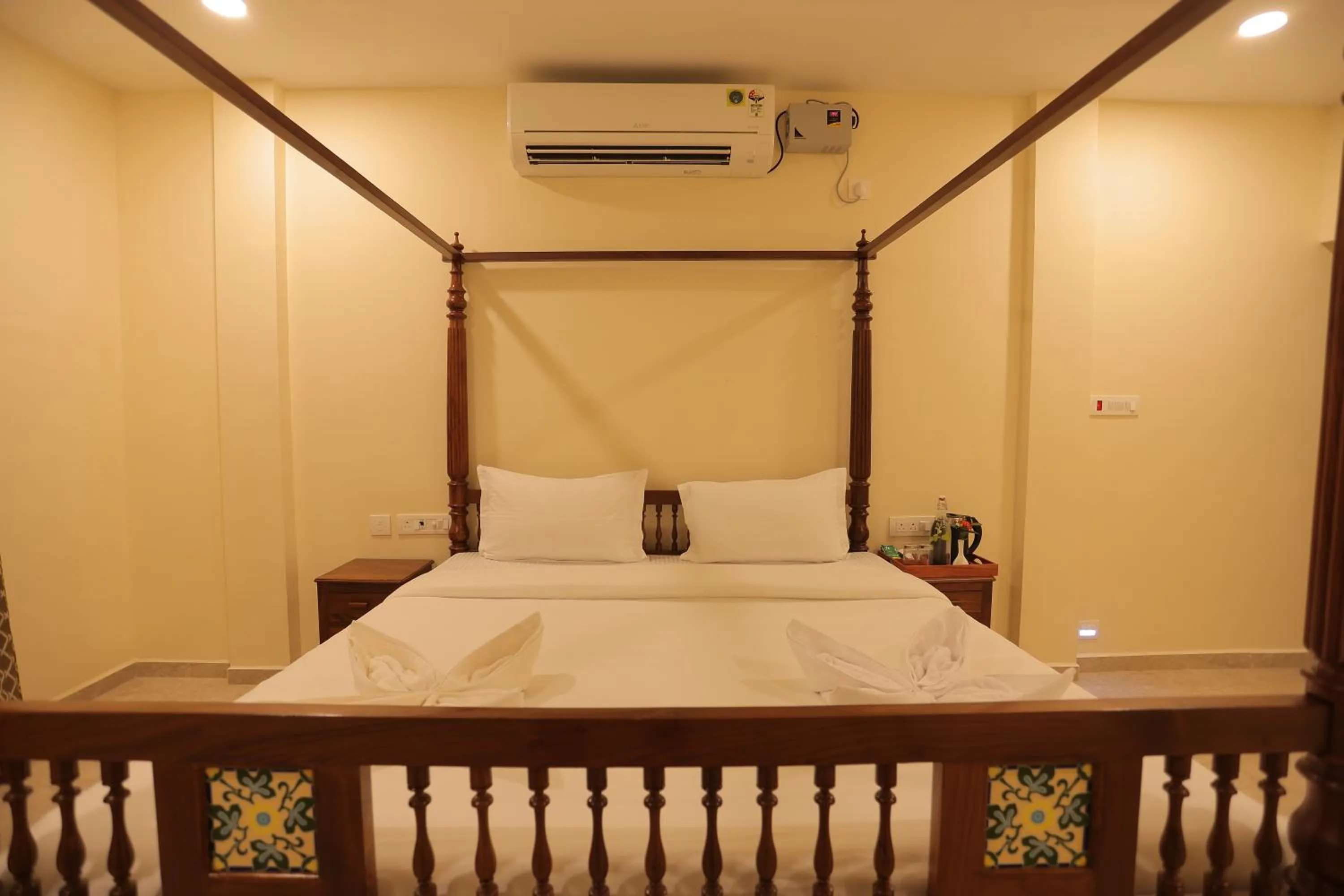 Bed in PALM PARADISE Beach Resort