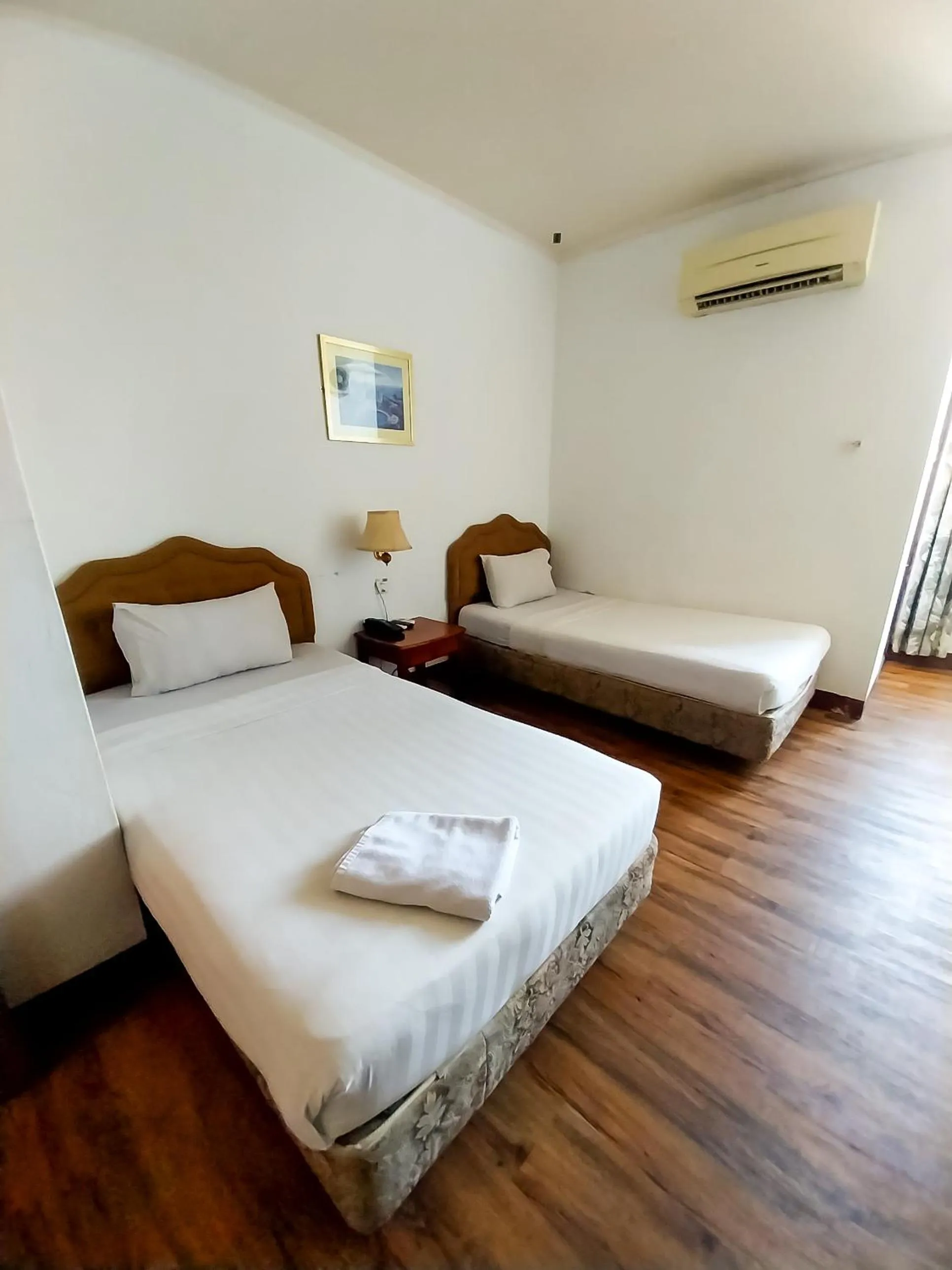 Bed in Hotel Holiday Park