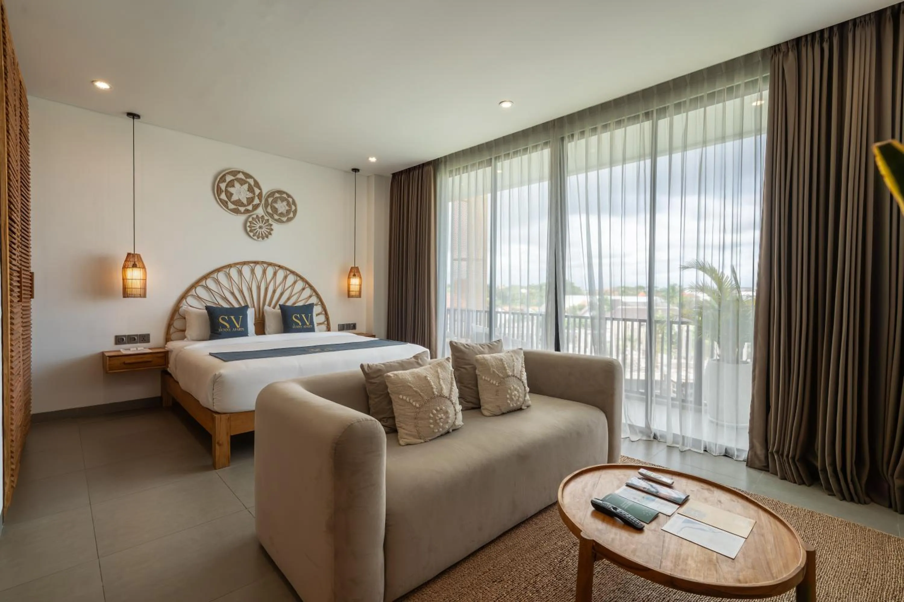 Seating area, Bed in Sunny Aparts 1 by Betterplace