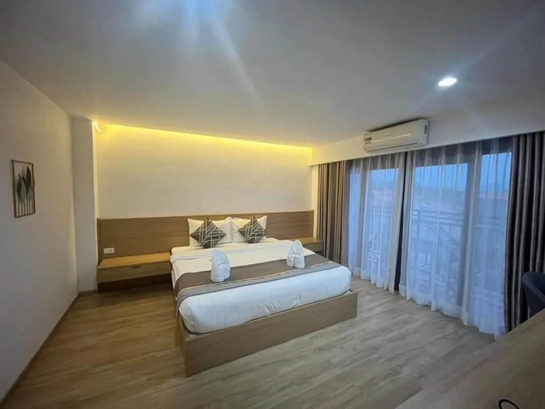 Bed in Remember Vangvieng Hotel