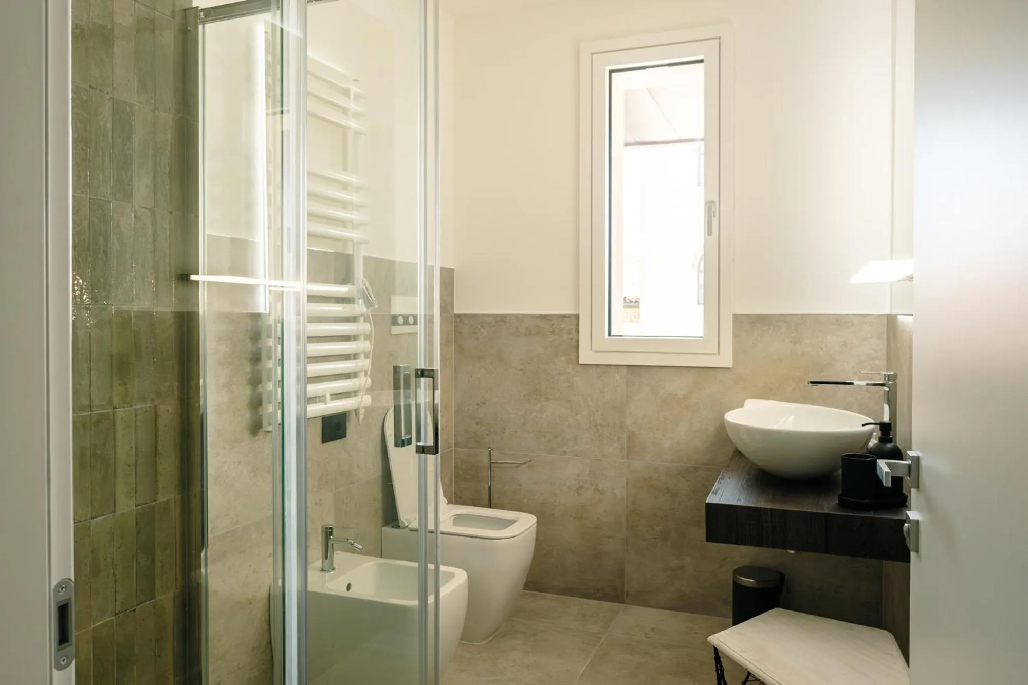 Bathroom in Camoma Aparthotel - Suites Apartments