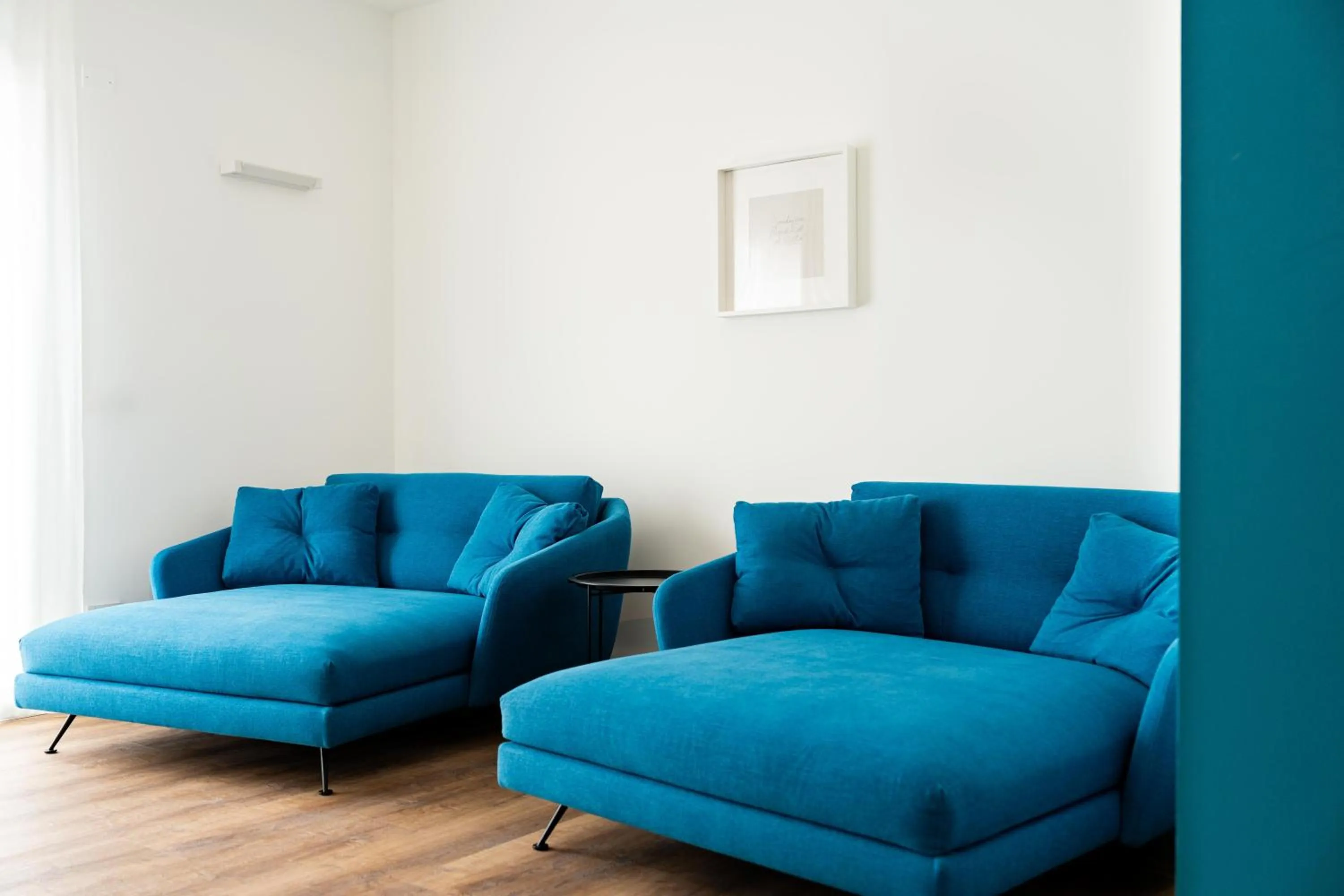 Living room in Camoma Aparthotel - Suites Apartments