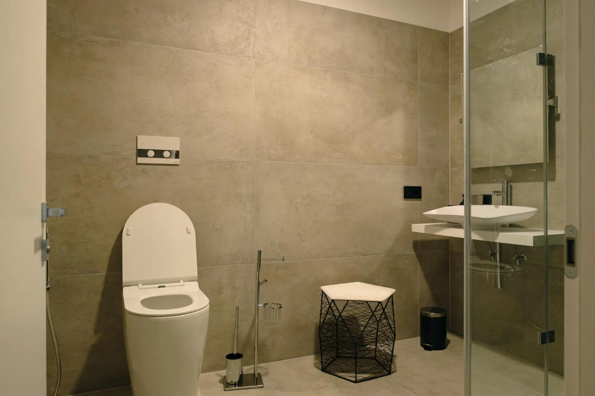 Bathroom in Camoma Aparthotel - Suites Apartments