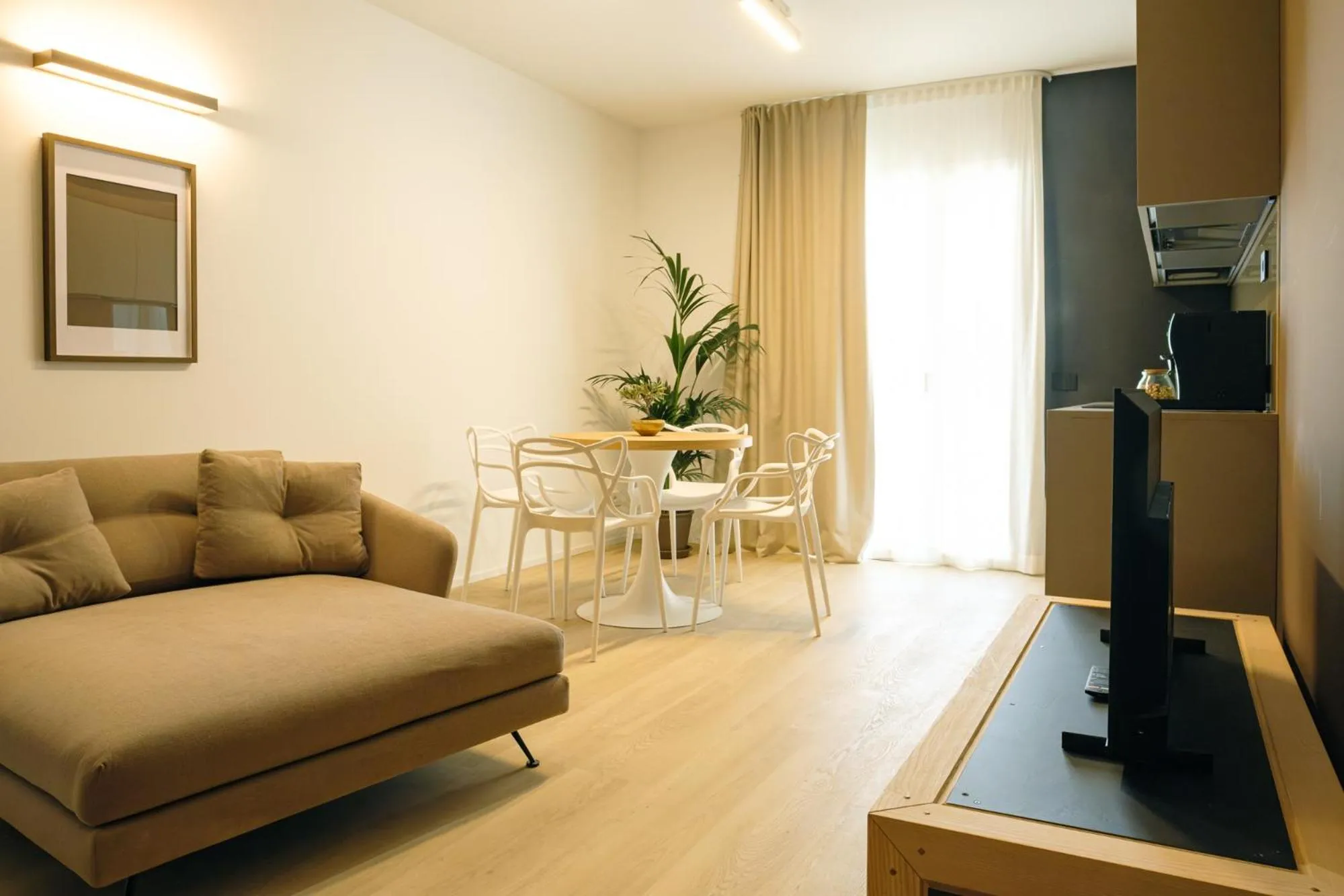 Living room in Camoma Aparthotel - Suites Apartments