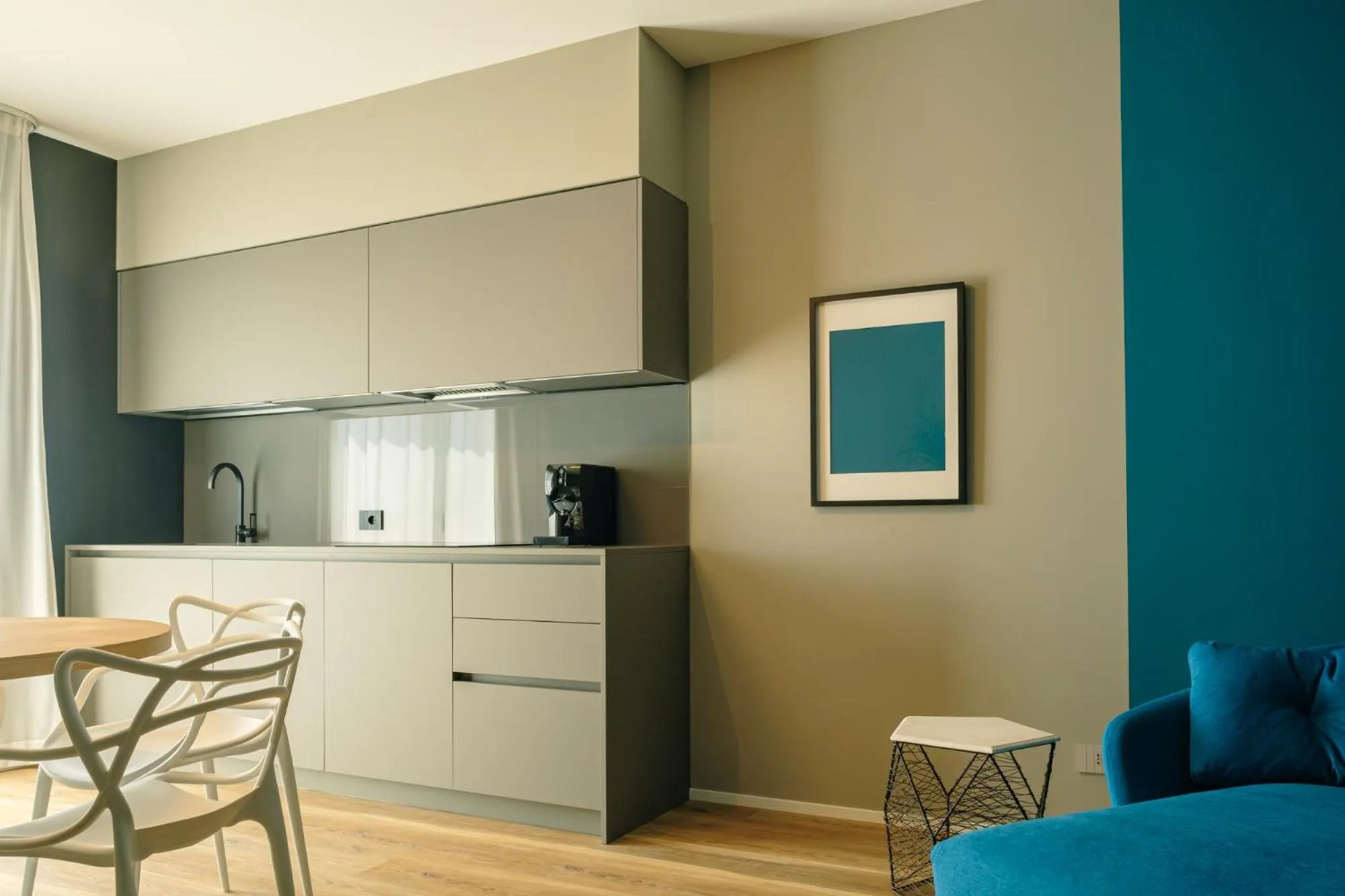 Living room in Camoma Aparthotel - Suites Apartments