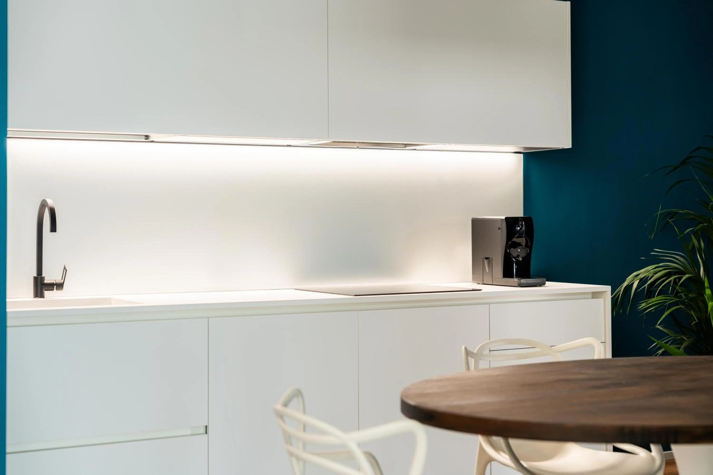 Kitchen or kitchenette in Camoma Aparthotel - Suites Apartments