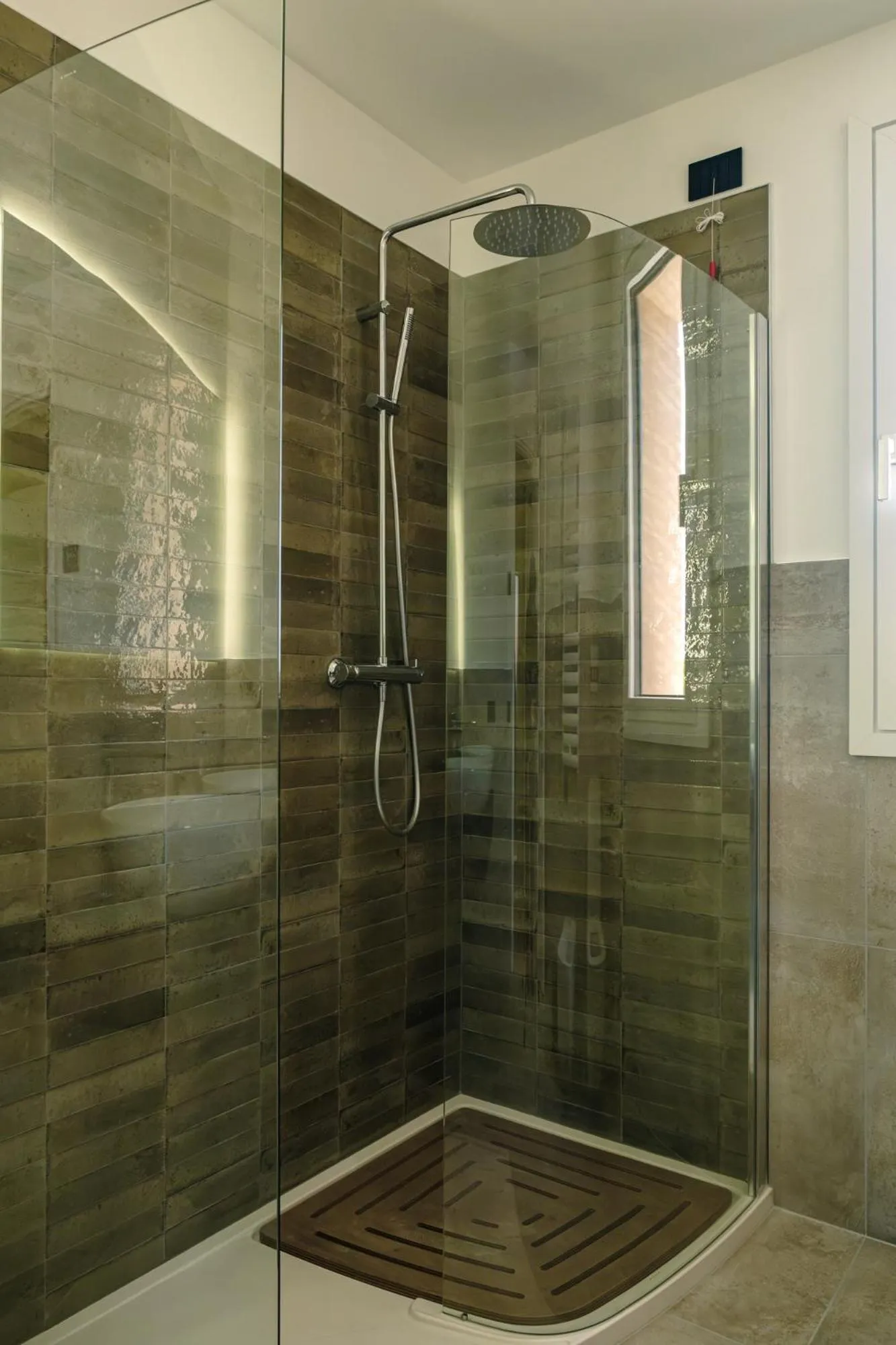Shower in Camoma Aparthotel - Suites Apartments