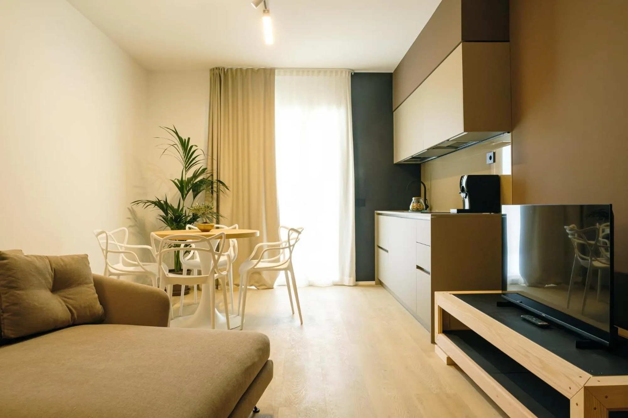 Living room in Camoma Aparthotel - Suites Apartments