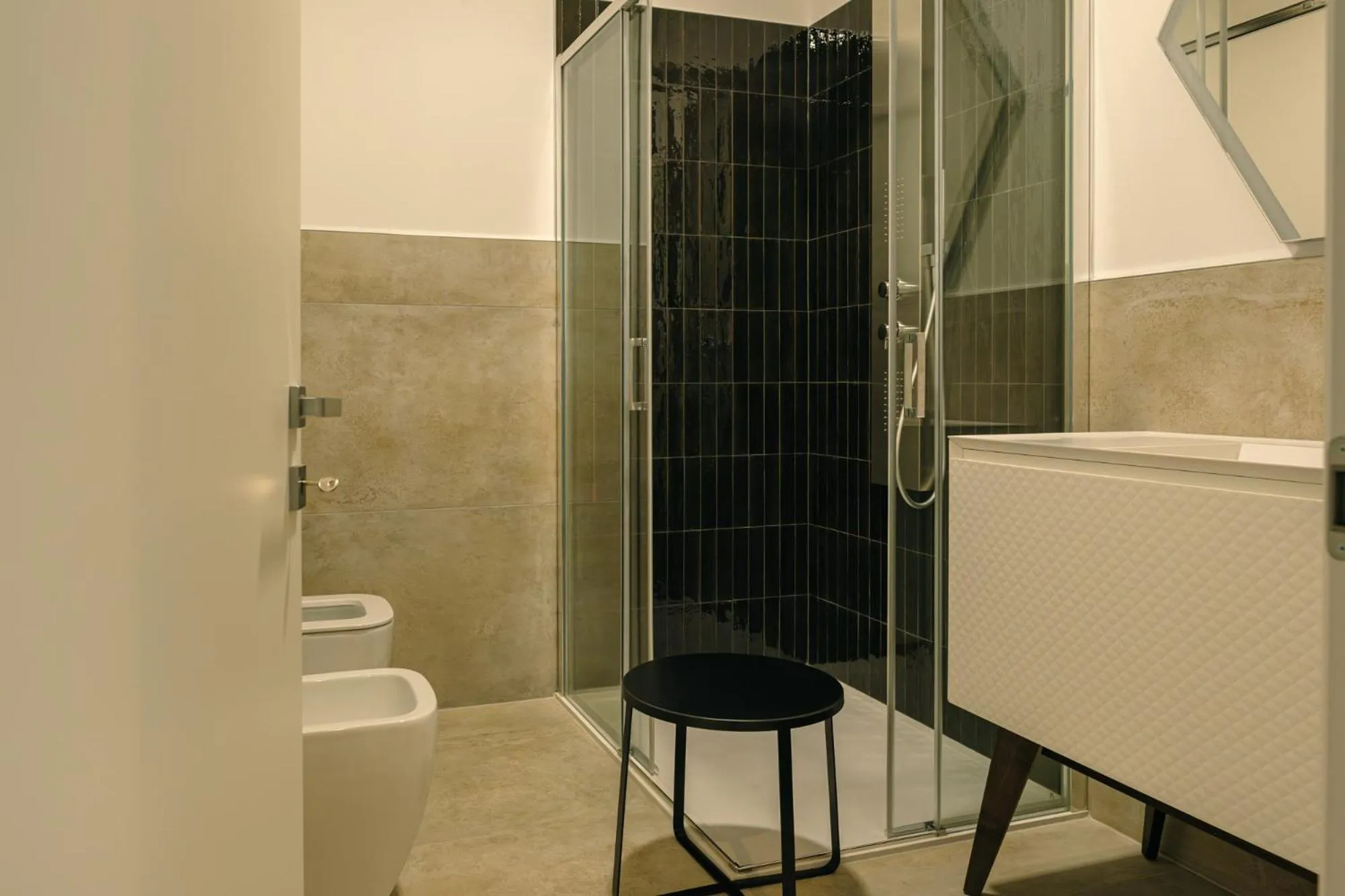 Bathroom in Camoma Aparthotel - Suites Apartments