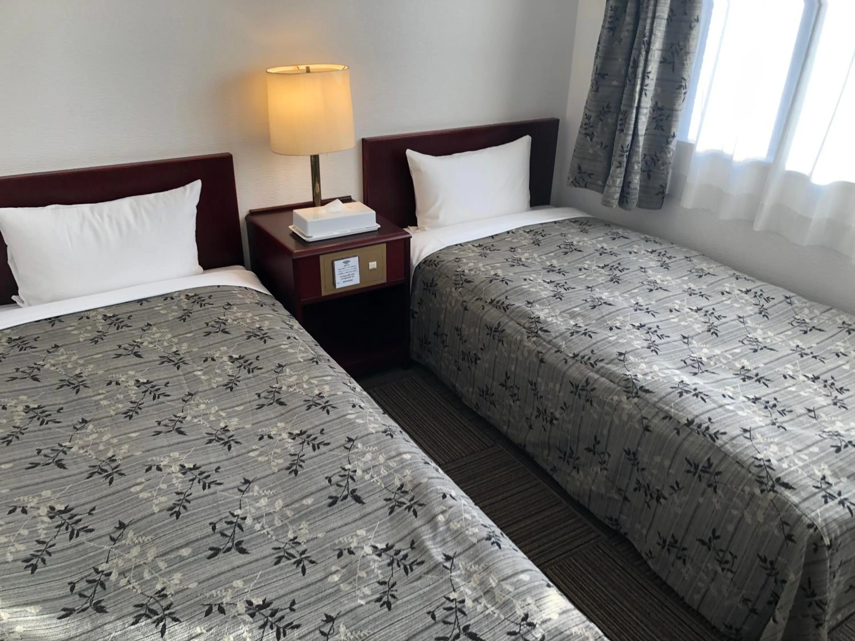 Photo of the whole room, Bed in Hotel Crown Hills Naruto