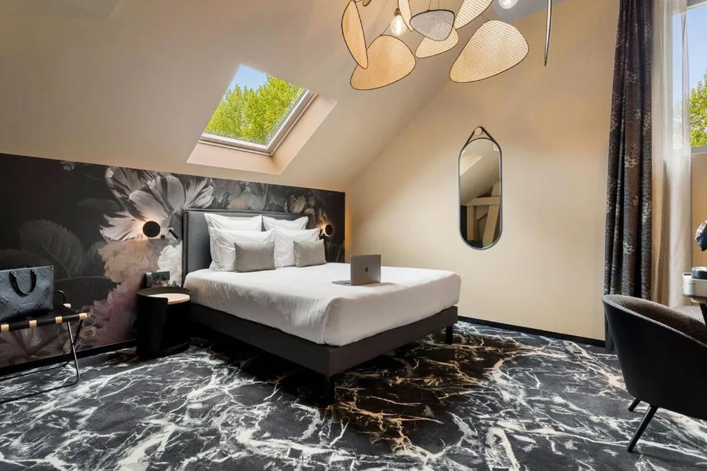 Bed in LE RITUEL HOTEL & SPA