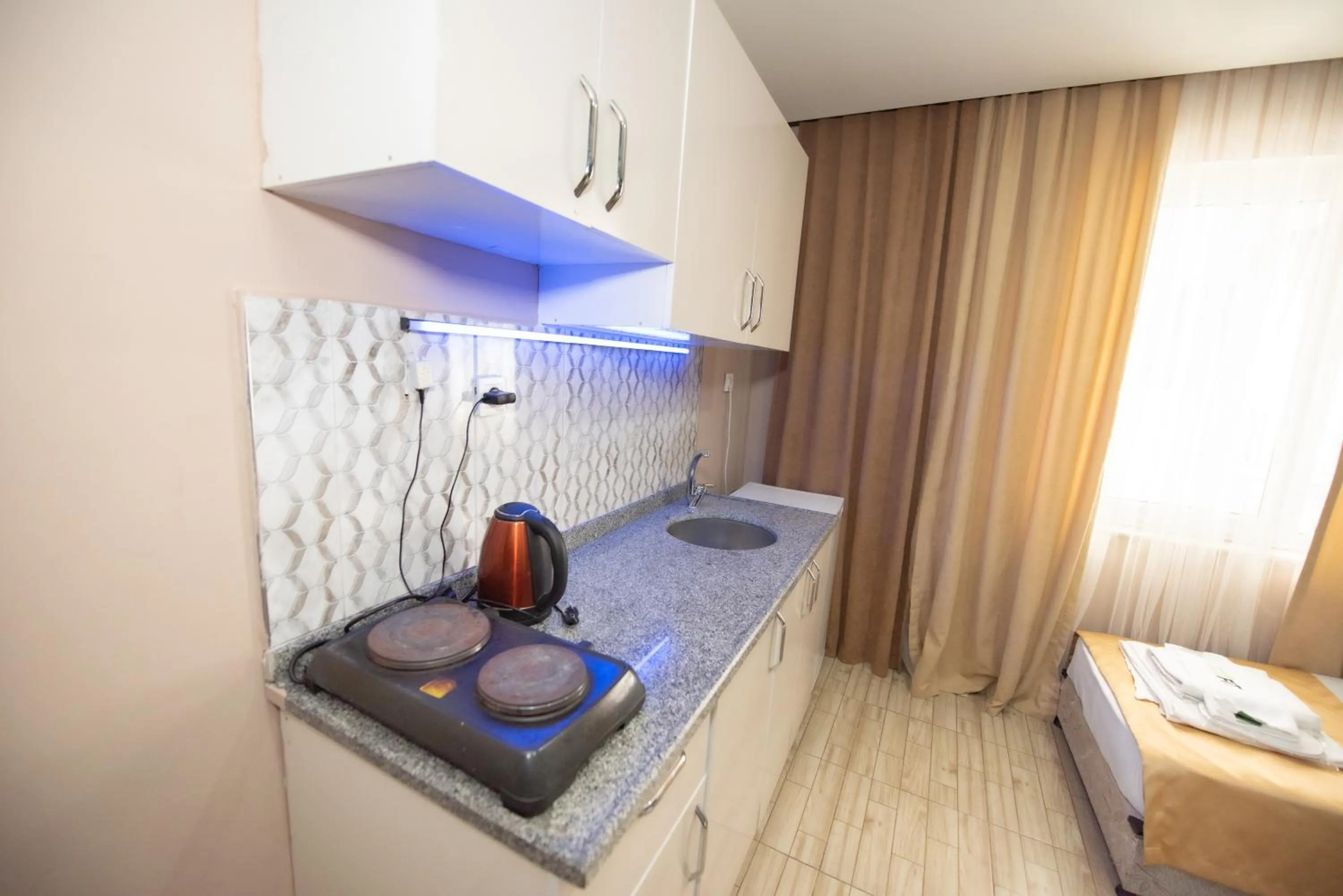 kitchen, Kitchen/Kitchenette in Palvan Hotel