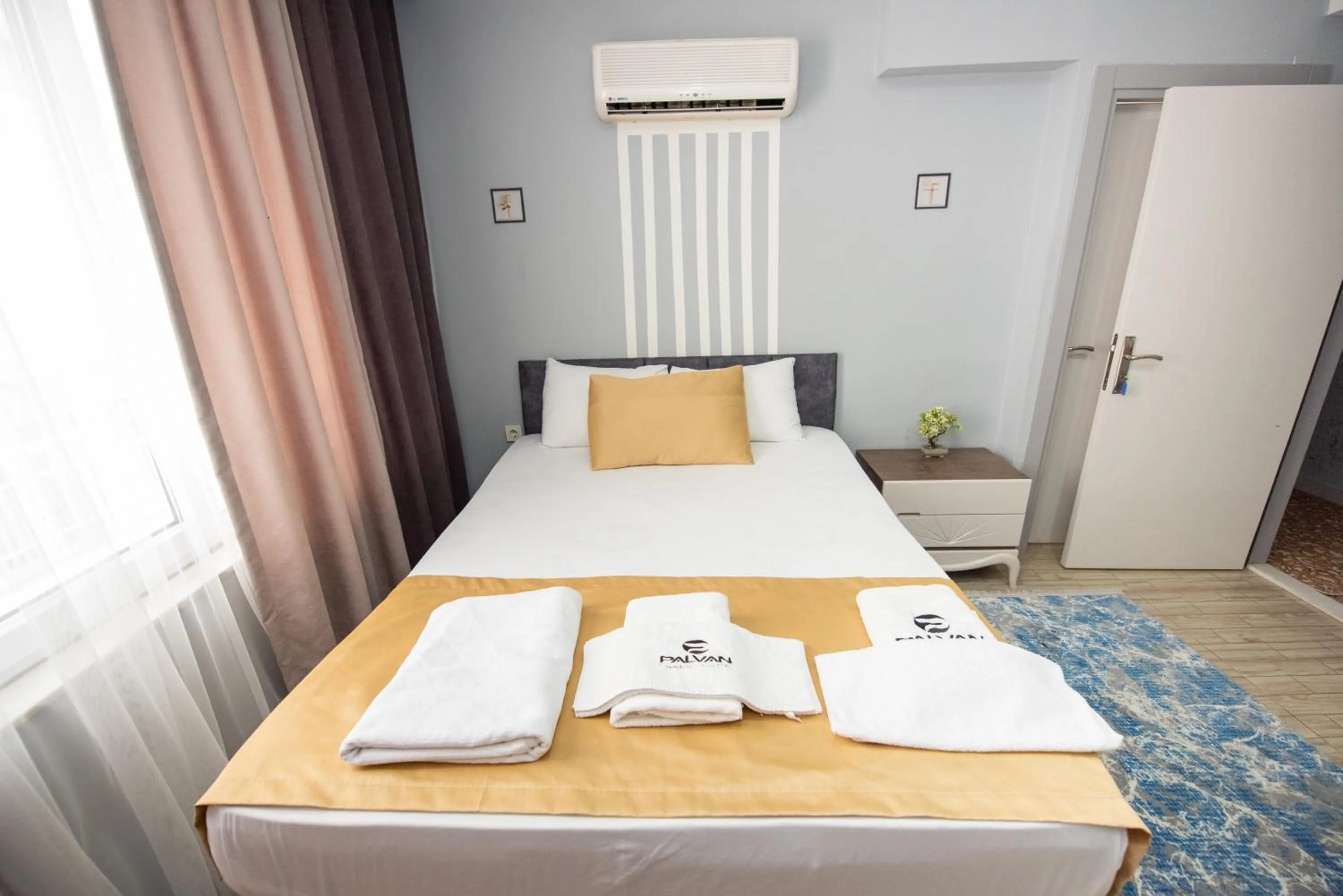 Bedroom in Palvan Hotel